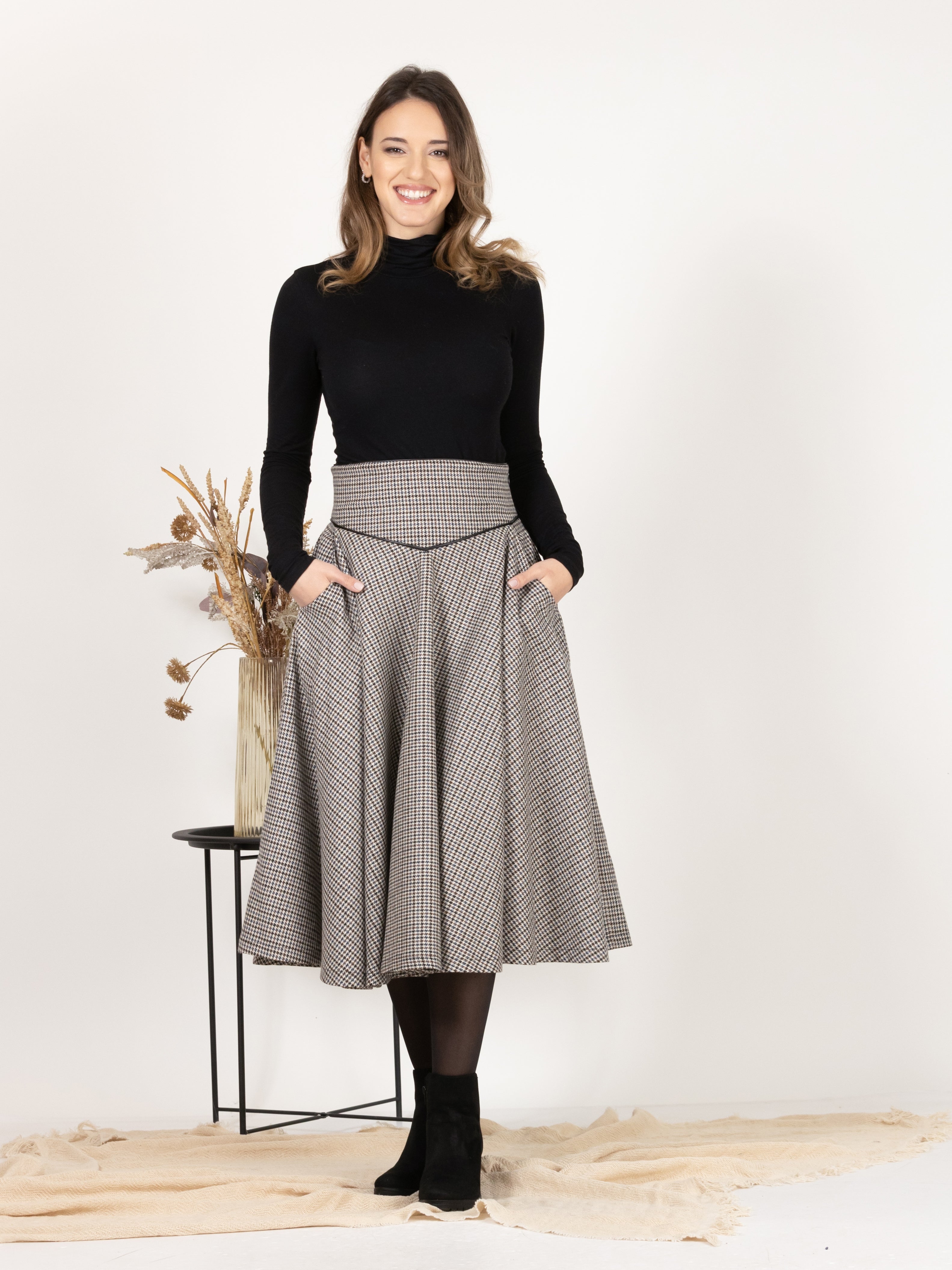 Elegant front view of Wool Midi Flare Skirt with High Waist in Houndstooth Pattern with pockets