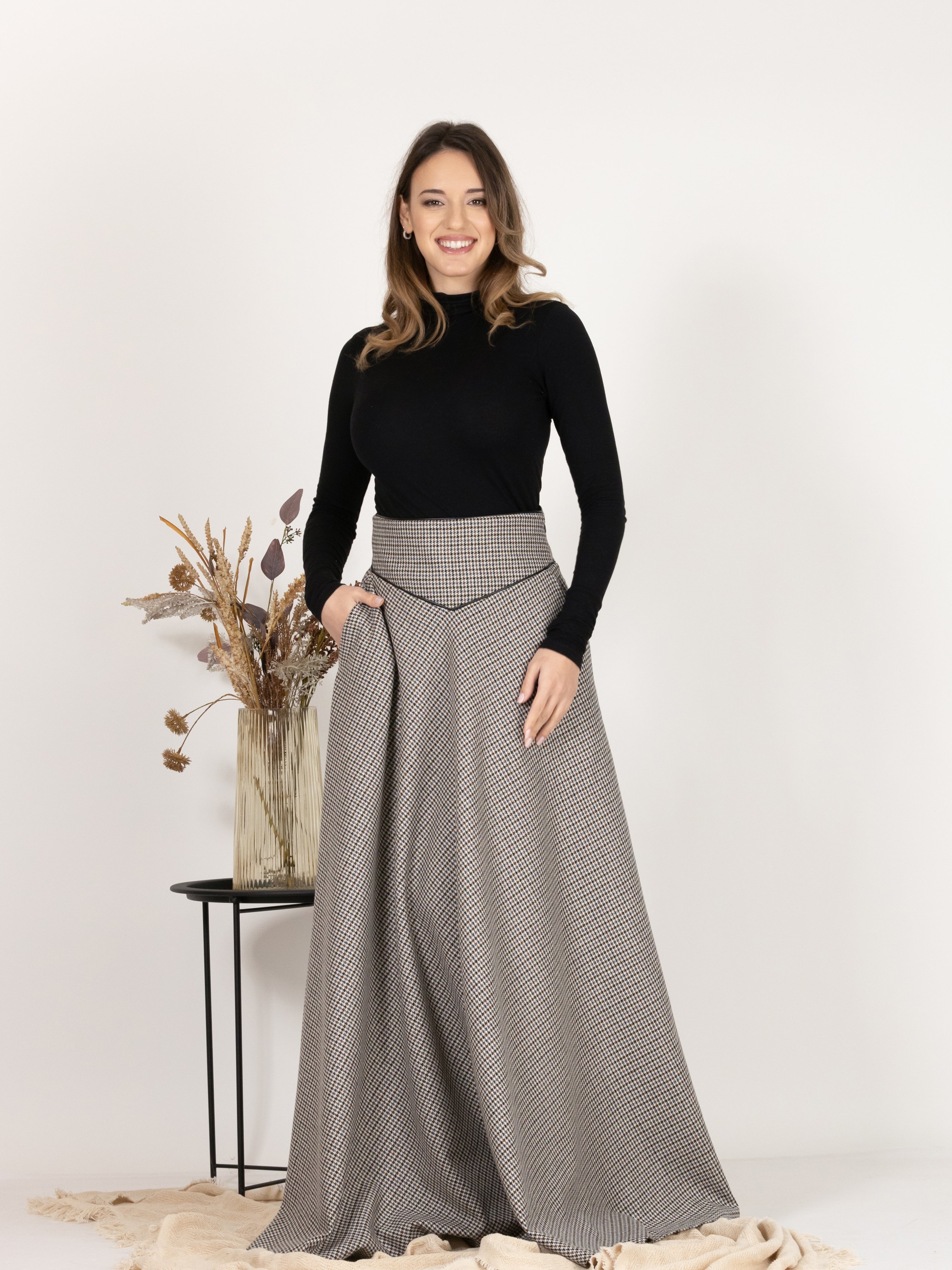 Front view of Floor Length Wool Houndstooth Skirt with High Waist and Pockets, emphasizing the maxi length