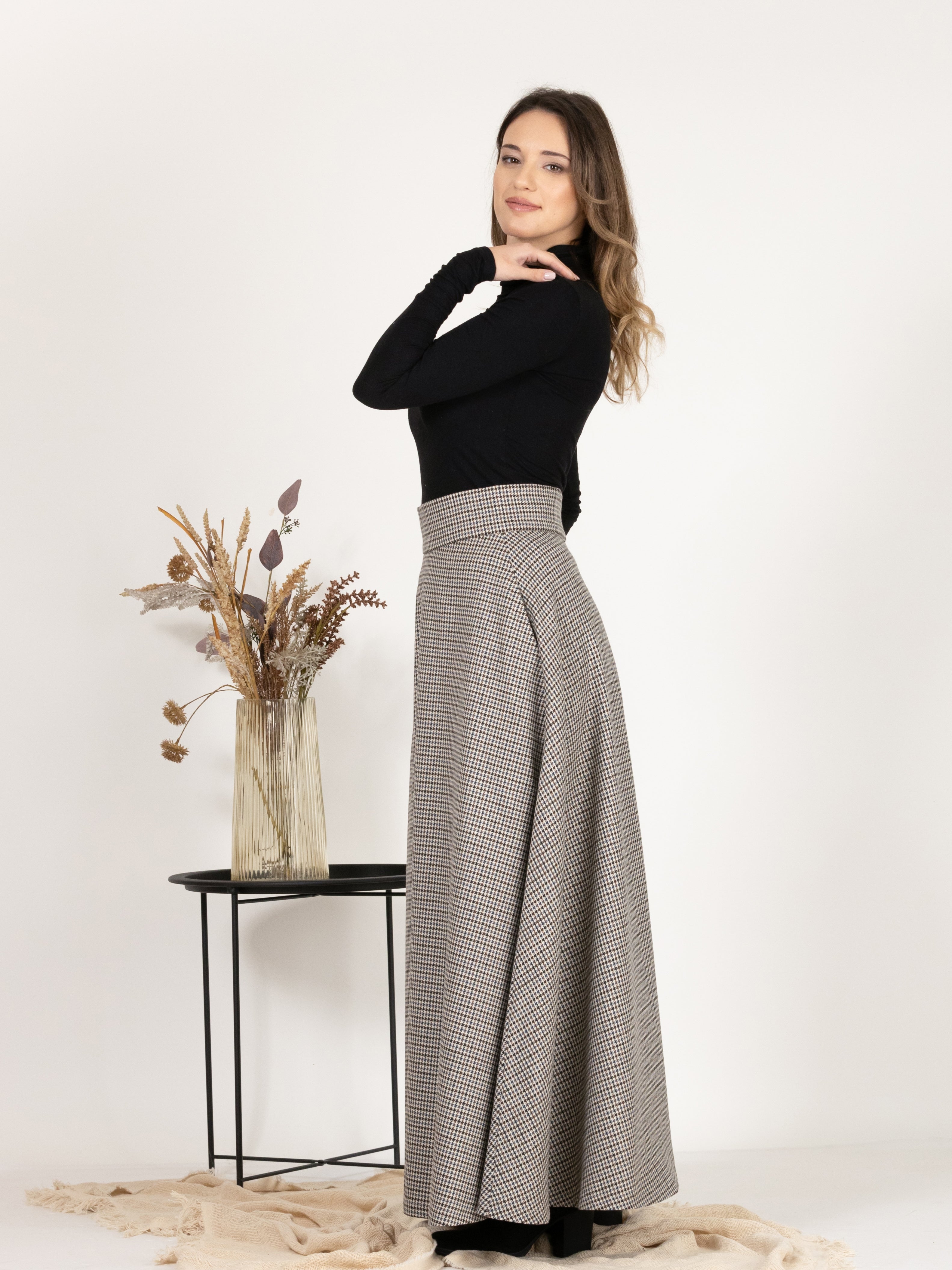 Side profile of Wool Maxi A-Line Skirt with Pockets in Houndstooth Pattern
highlighting the maxi length
