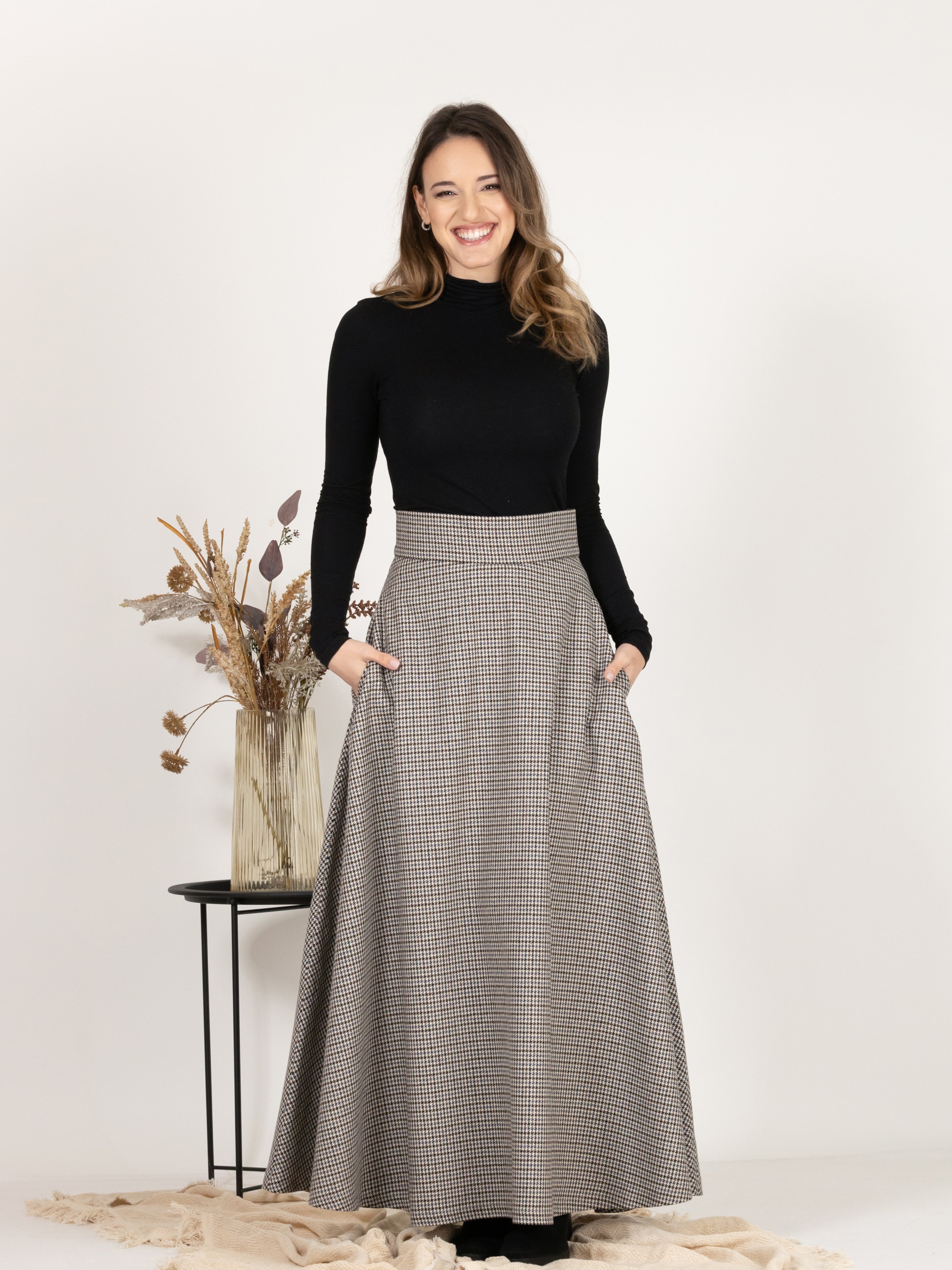 Front view emphasizing the timeless, classic design of Wool Maxi A-Line Skirt with Pockets in Houndstooth Pattern