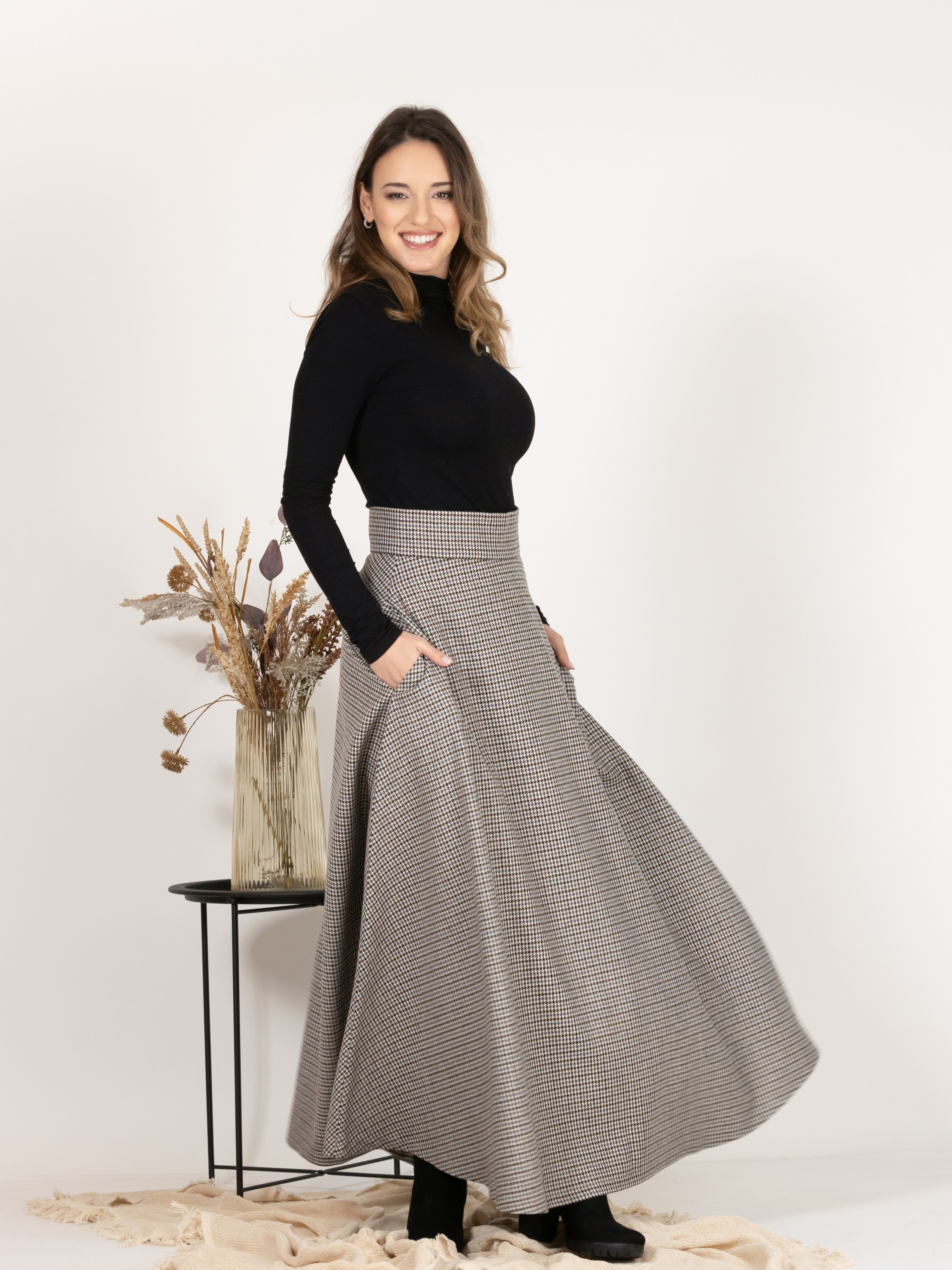 Elegant side view of Wool Maxi A-Line Skirt with Pockets in Houndstooth Pattern