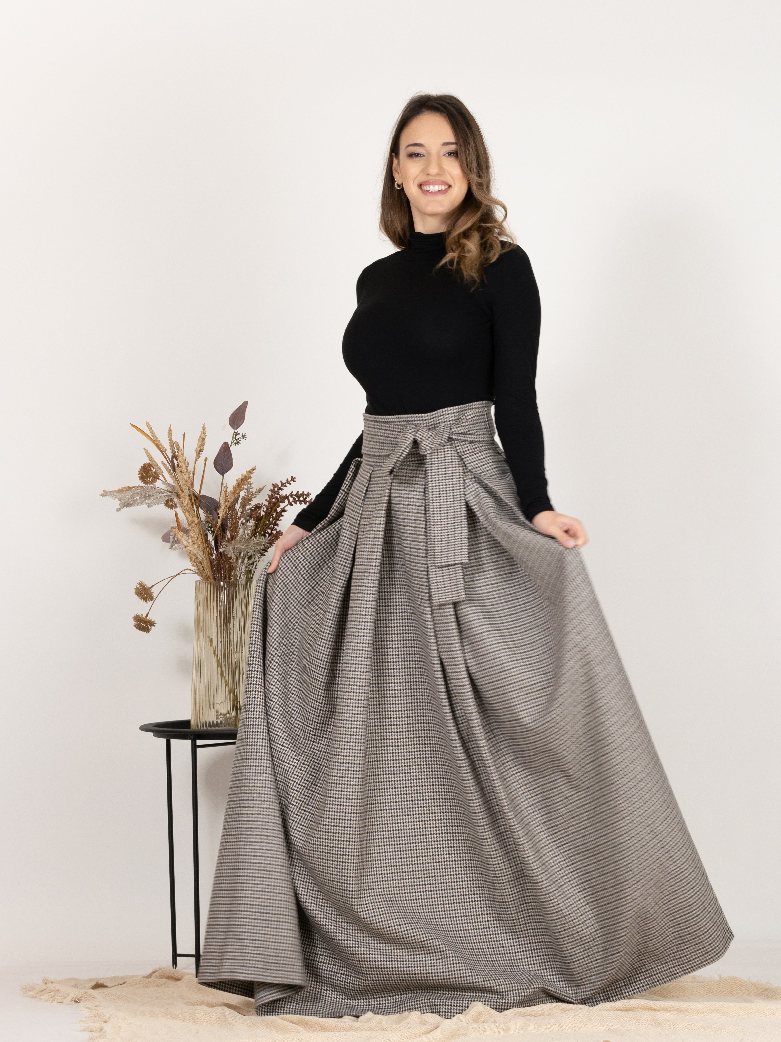 Front view emphasizing the timeless, classic design of High Waisted Wool Long Skirt with Bow in Houndstooth Pattern