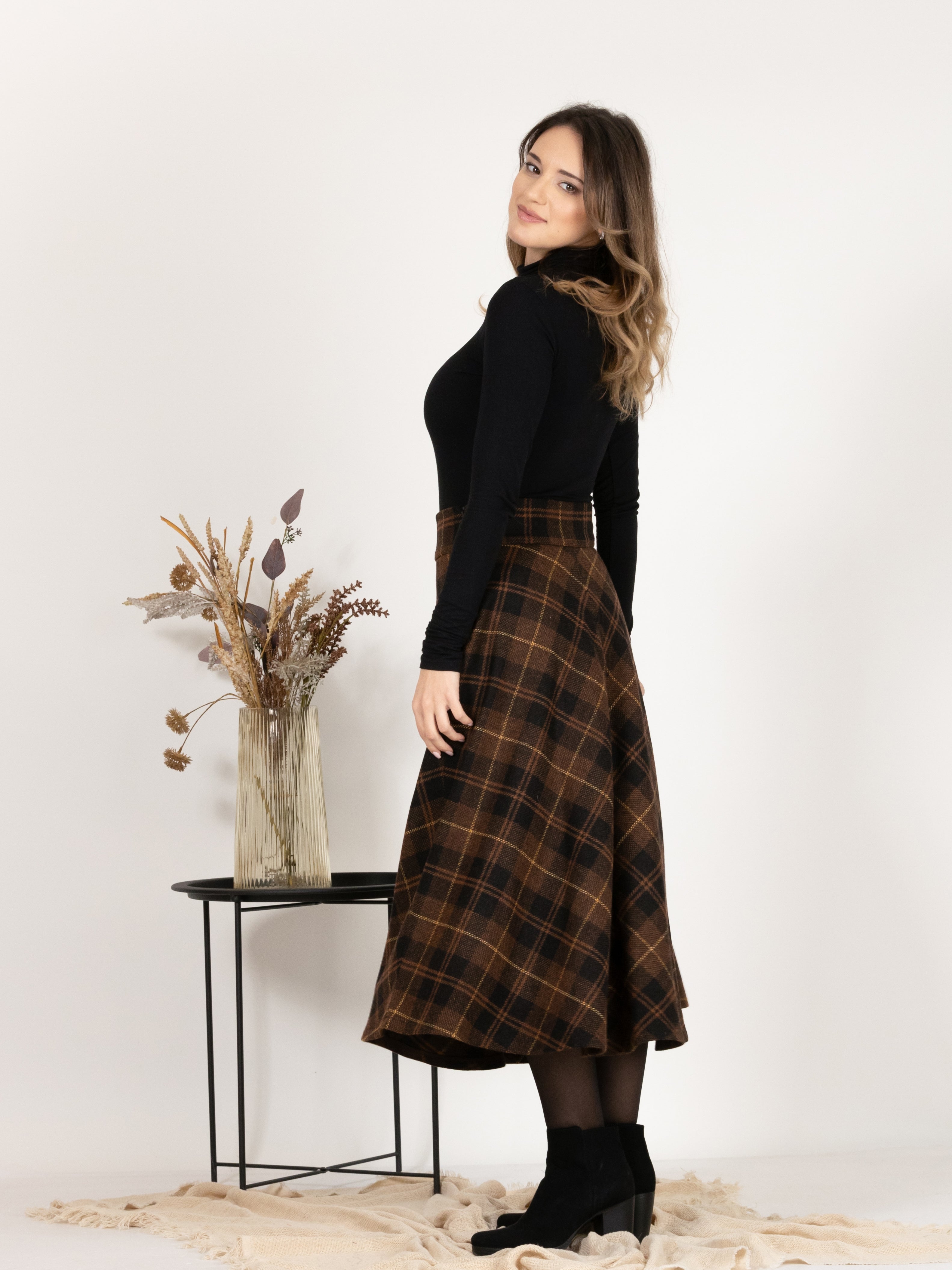 Back view of Midi Wool Plaid Skirt with High Waist and Pockets emphasizing the mid-calf length