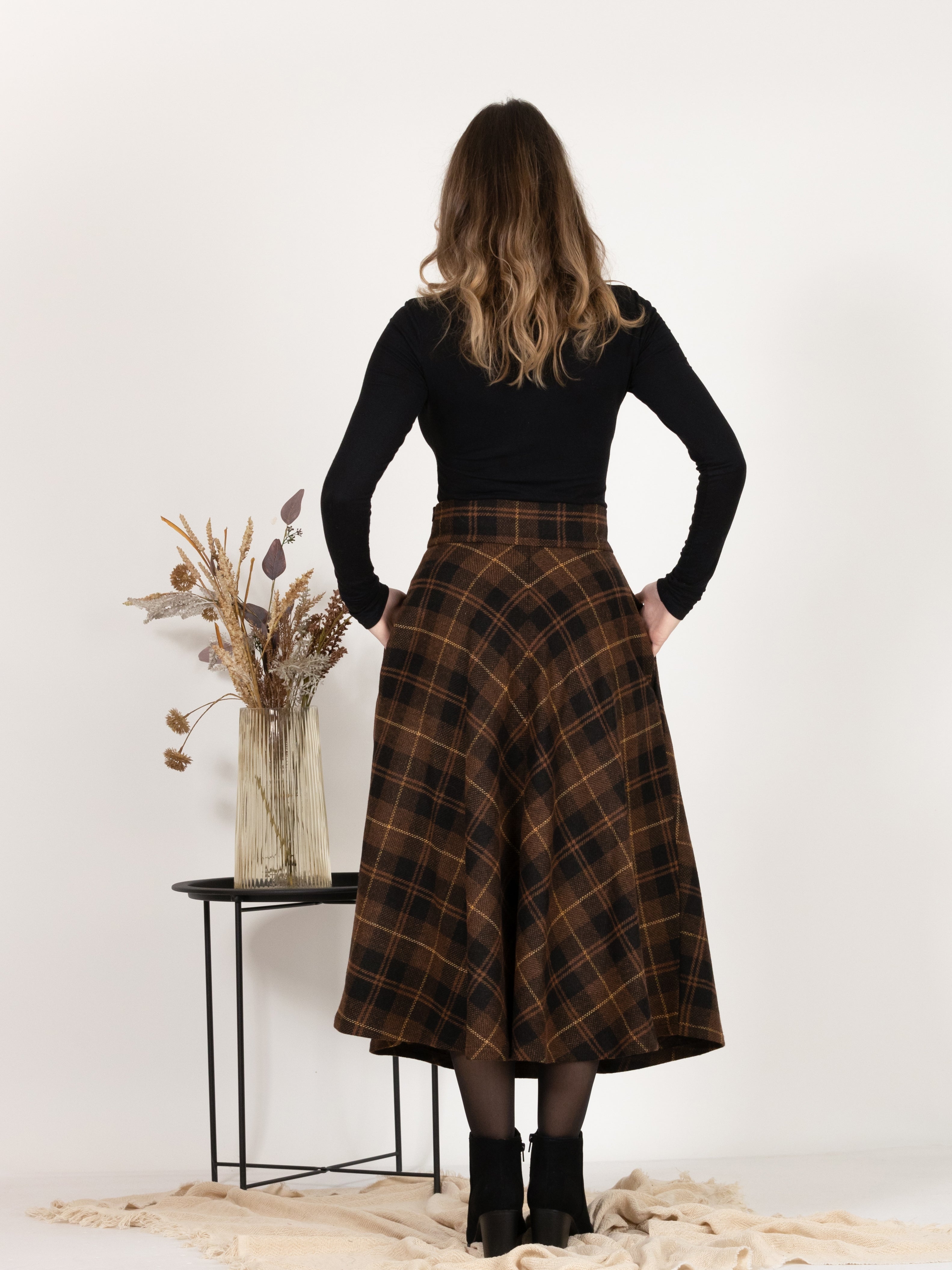 Back view of Midi Wool Plaid Skirt with High Waist and Pockets emphasizing the high-waist