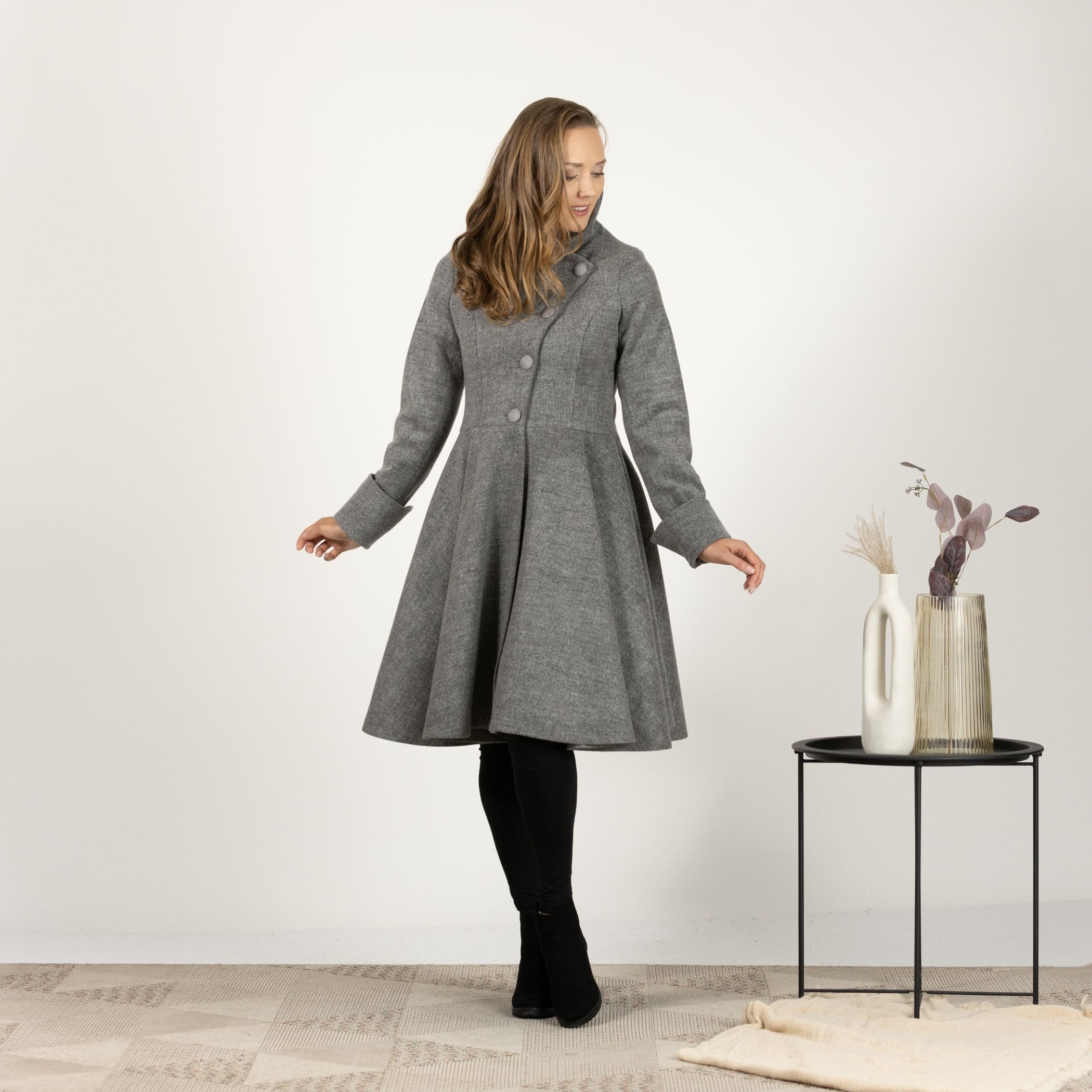 Close-up front view of the Gray A-line Buttoned Winter Coat, focusing on the intricate button detailing and the fine texture of the wool fabric.