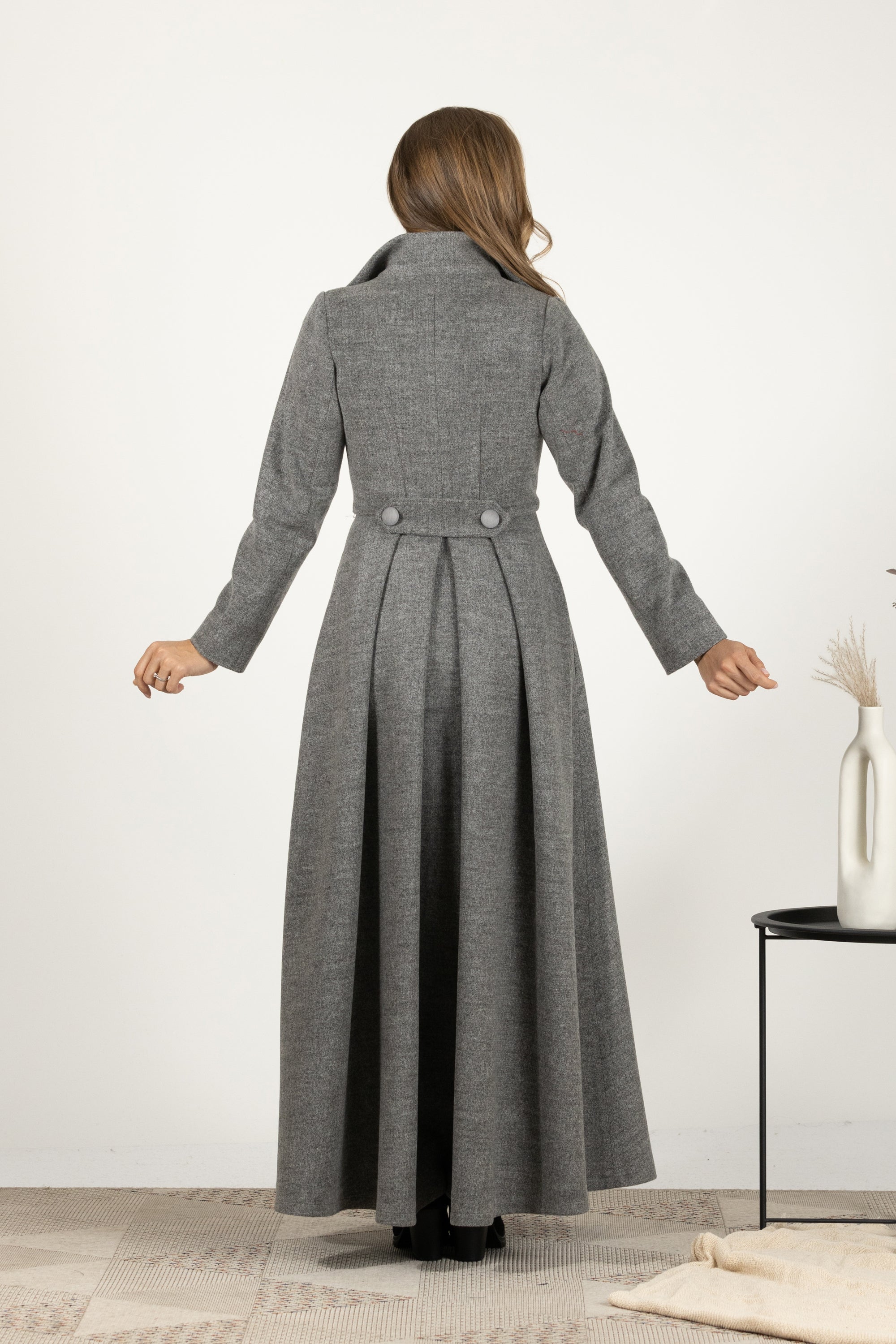 Back view of Retro-style wool maxi coat with front buttons