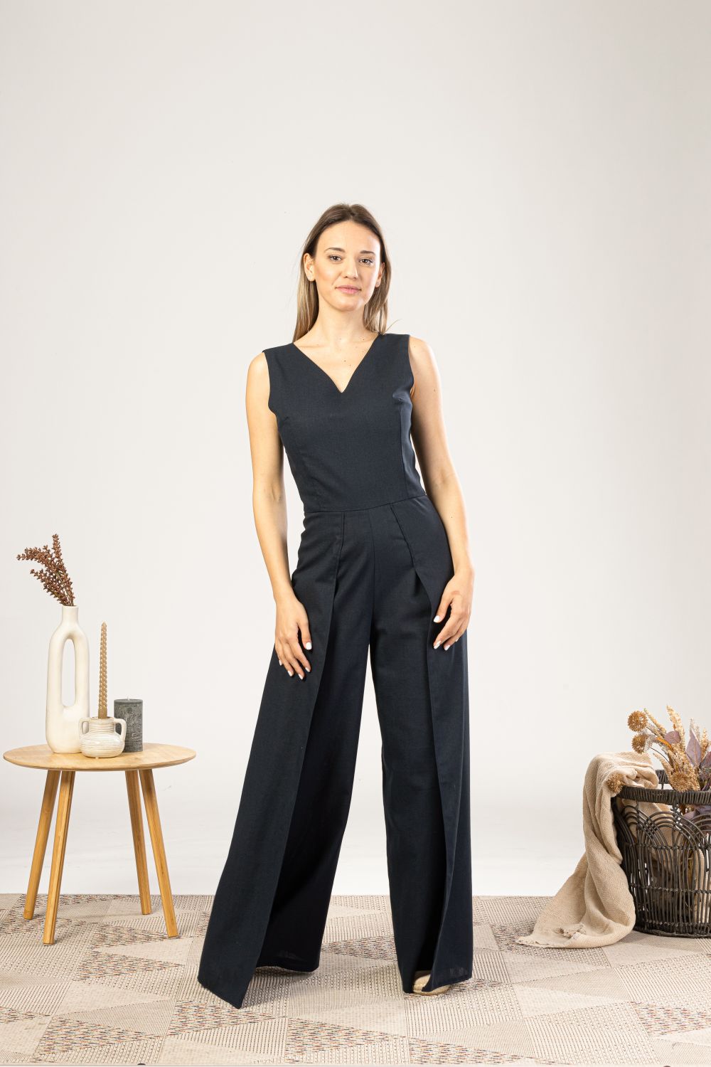 Black Linen Maxi Jumpsuit with Flaps from the front side view- from NikkaPlace | Effortless fashion for easy living
