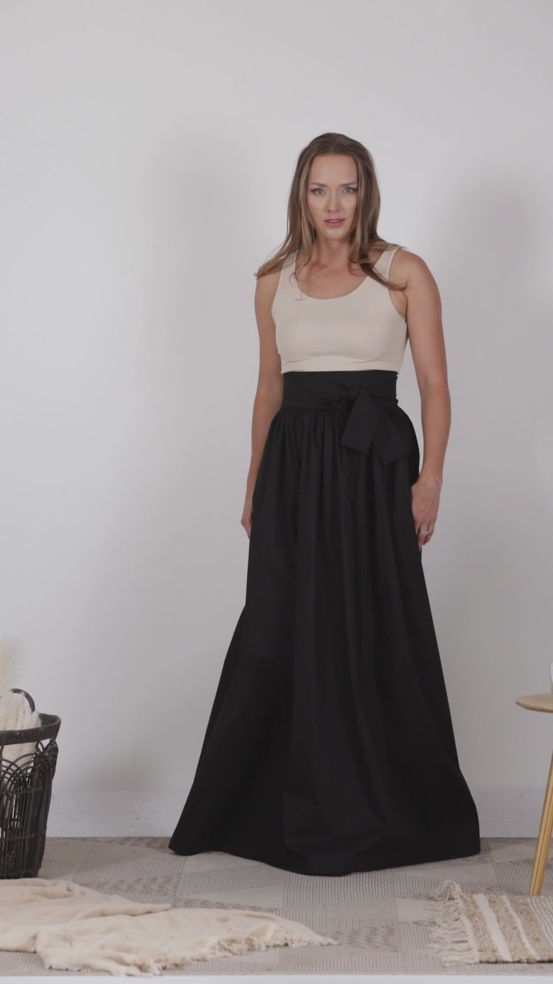 Full view of High-waisted dark cotton skirt with loose fit