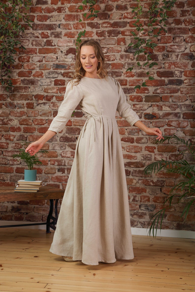 How to wear linen in summer, woman in a natural long-sleeve linen maxi dress