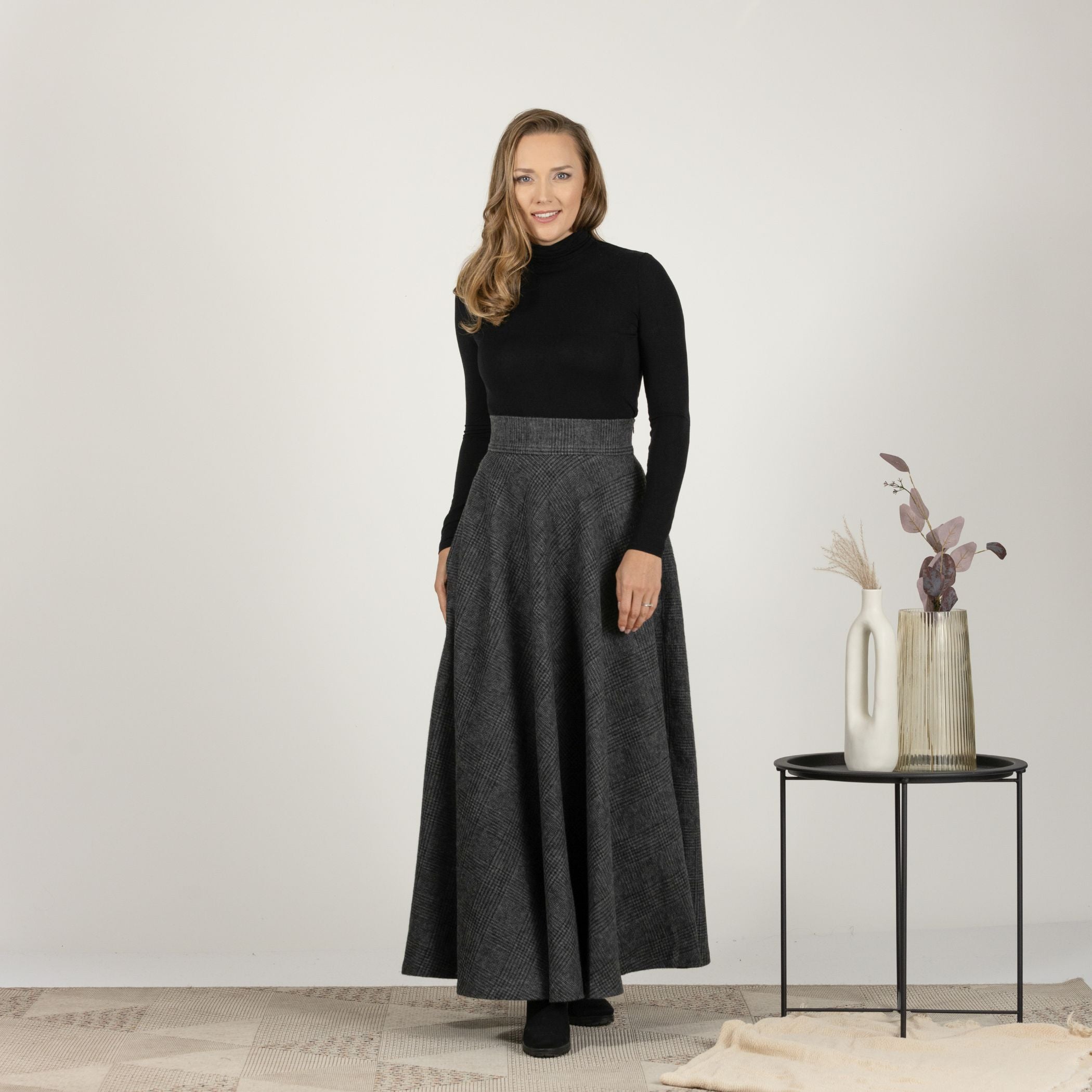 Full-length front view of the Gray Plaid High Waisted Wool Maxi Skirt, highlighting the sophisticated plaid pattern and elastic waistband.