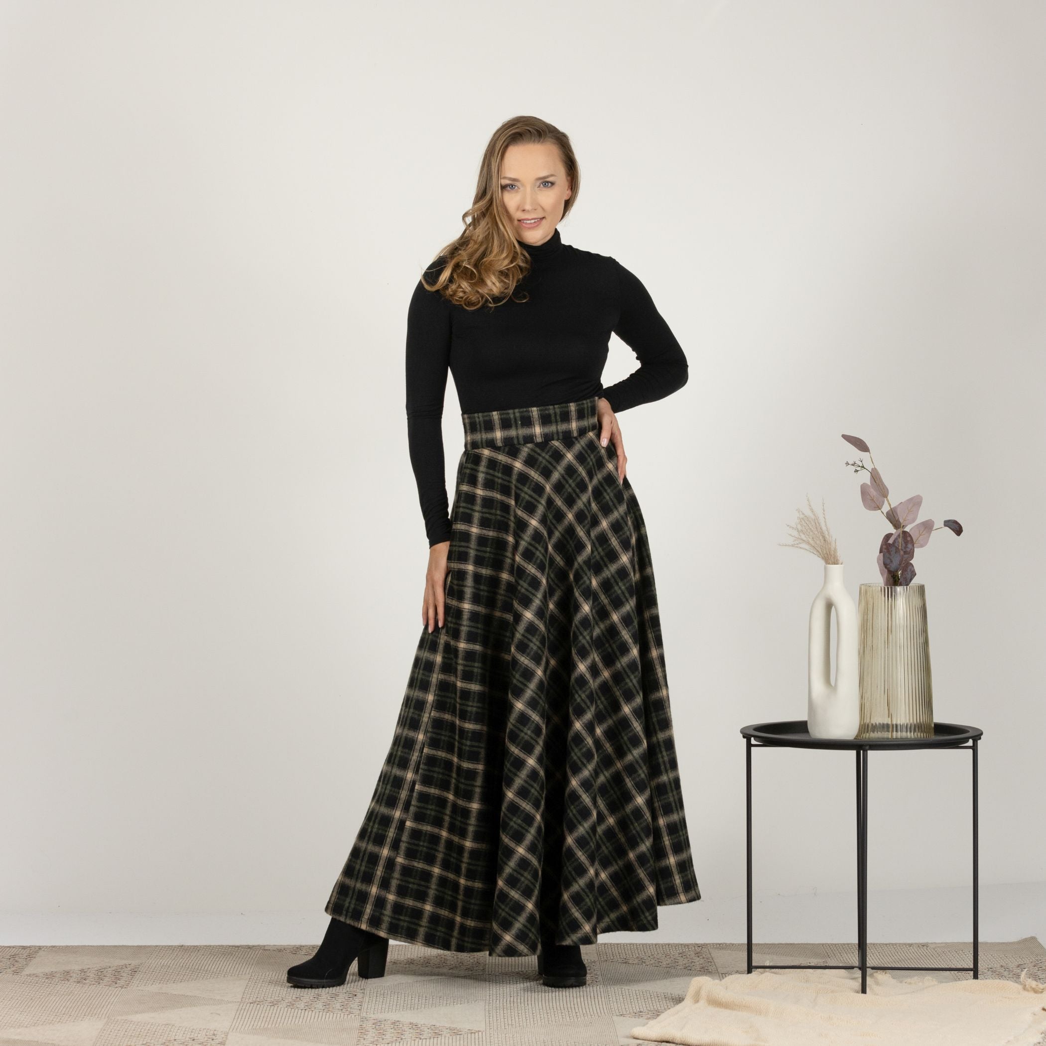 Full-length front view of the Brown Plaid High Waisted Wool Maxi Skirt, highlighting the warm plaid pattern and elastic waistband.