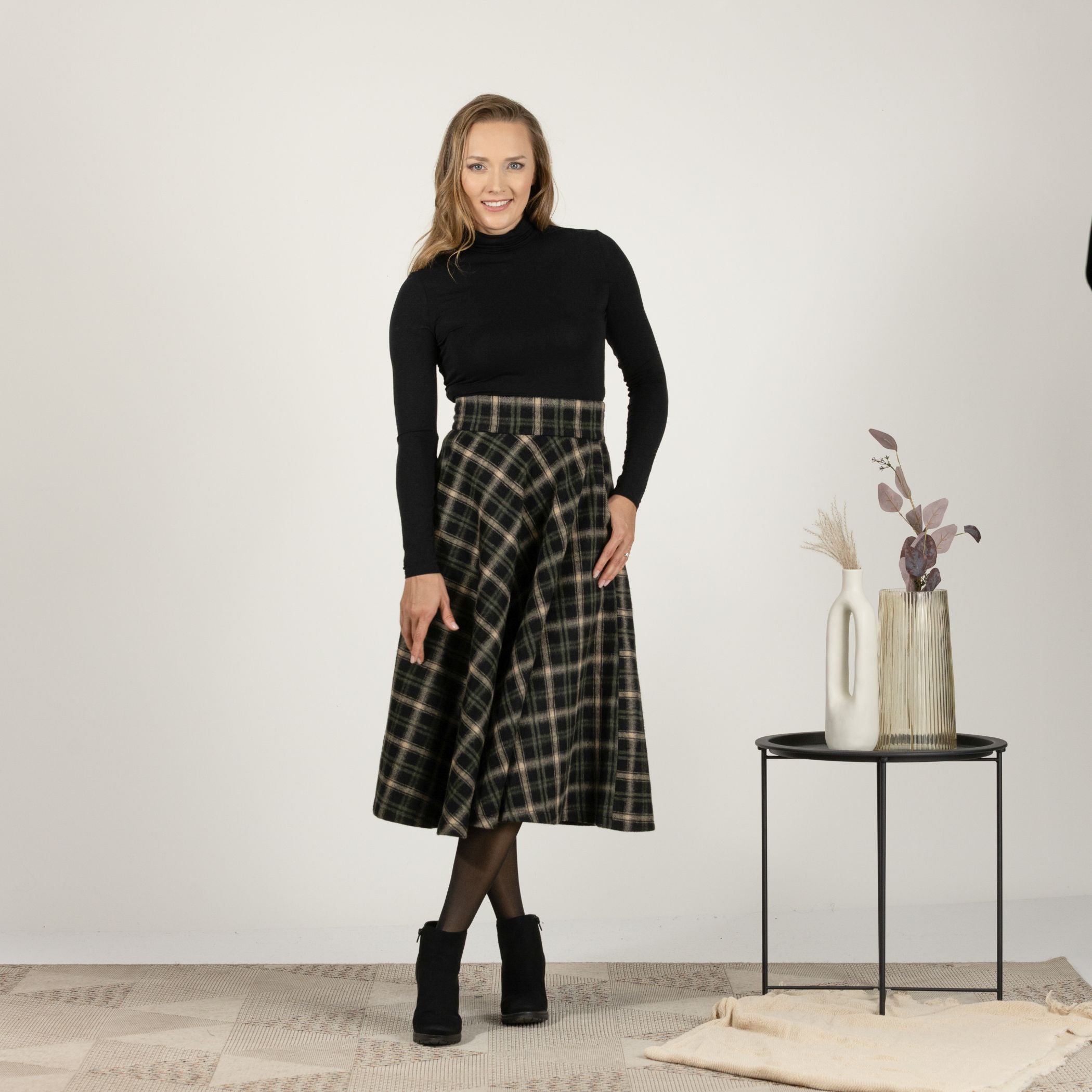 Full-length front view of the Brown Plaid High Waisted Wool Midi Skirt, highlighting the soft cool wool fabric and the timeless plaid design.