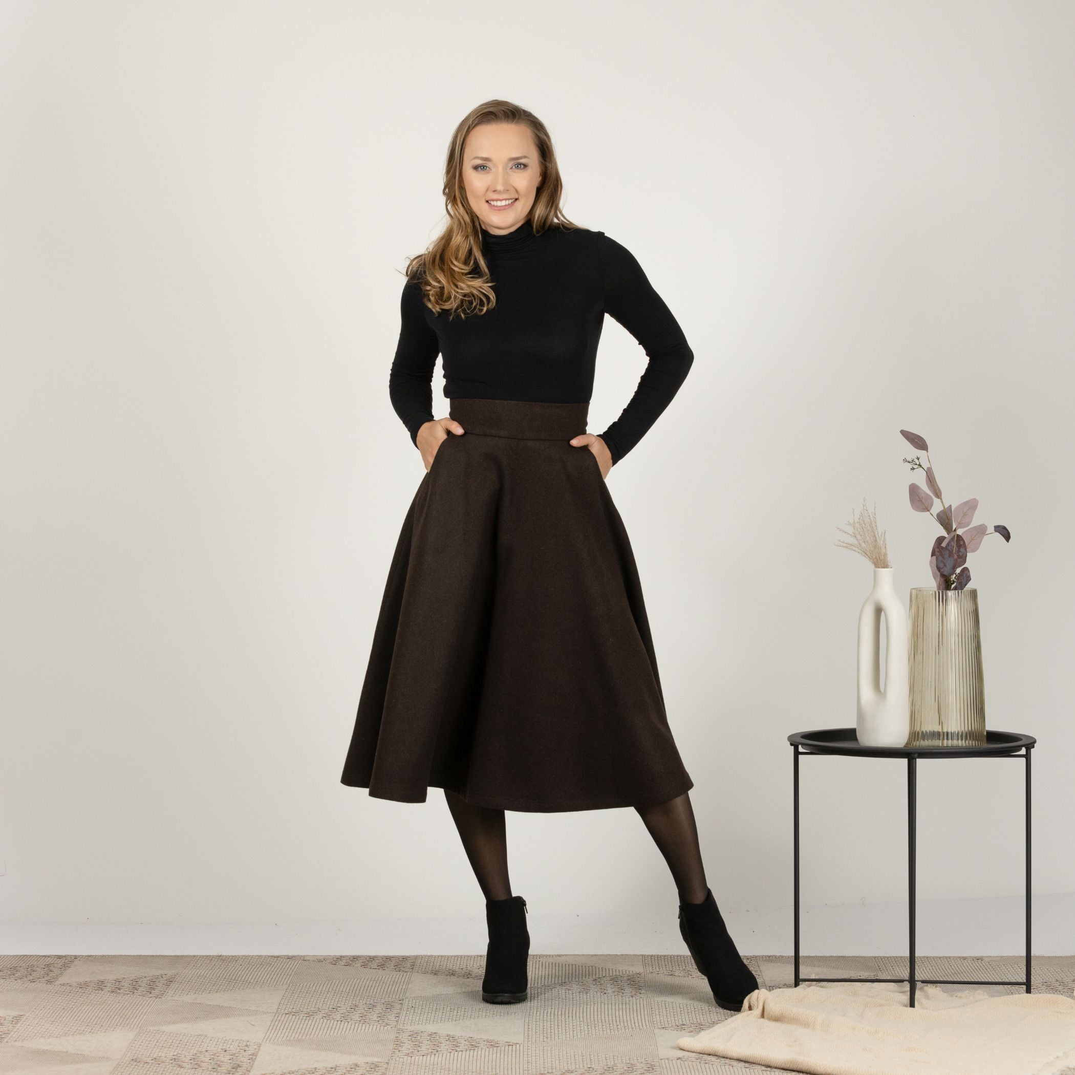 Full-length front view of the Brown High Waisted Wool Midi Skirt, highlighting the soft cool wool fabric and the timeless plaid design.