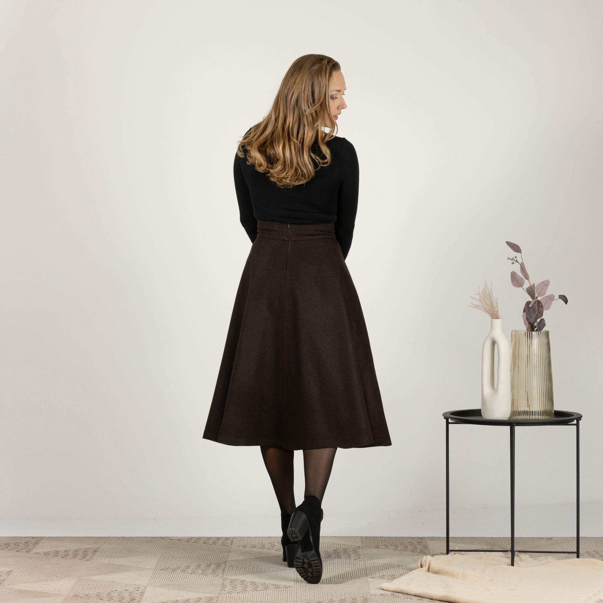 Close-up back view of the Brown High Waisted Wool Midi Skirt, focusing on the high-quality wool fabric and the defined waist.