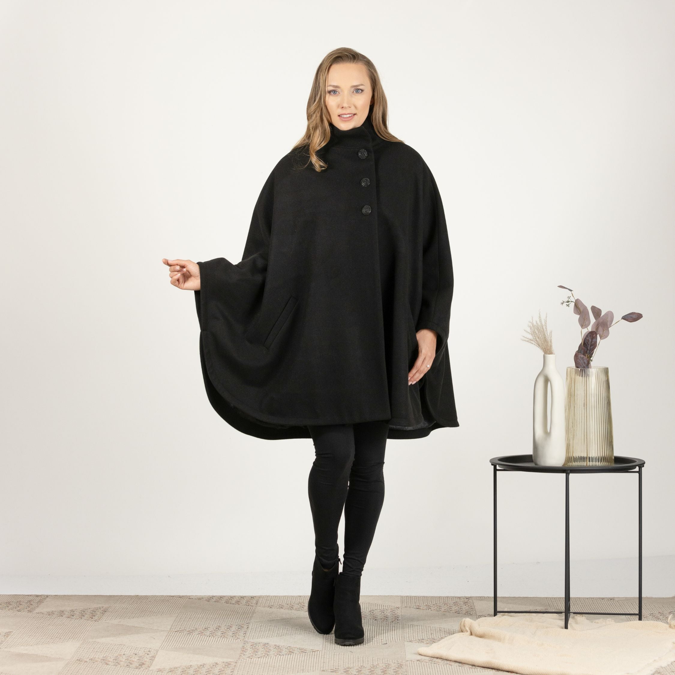 Front view of Wool Poncho Coat paired with a dress