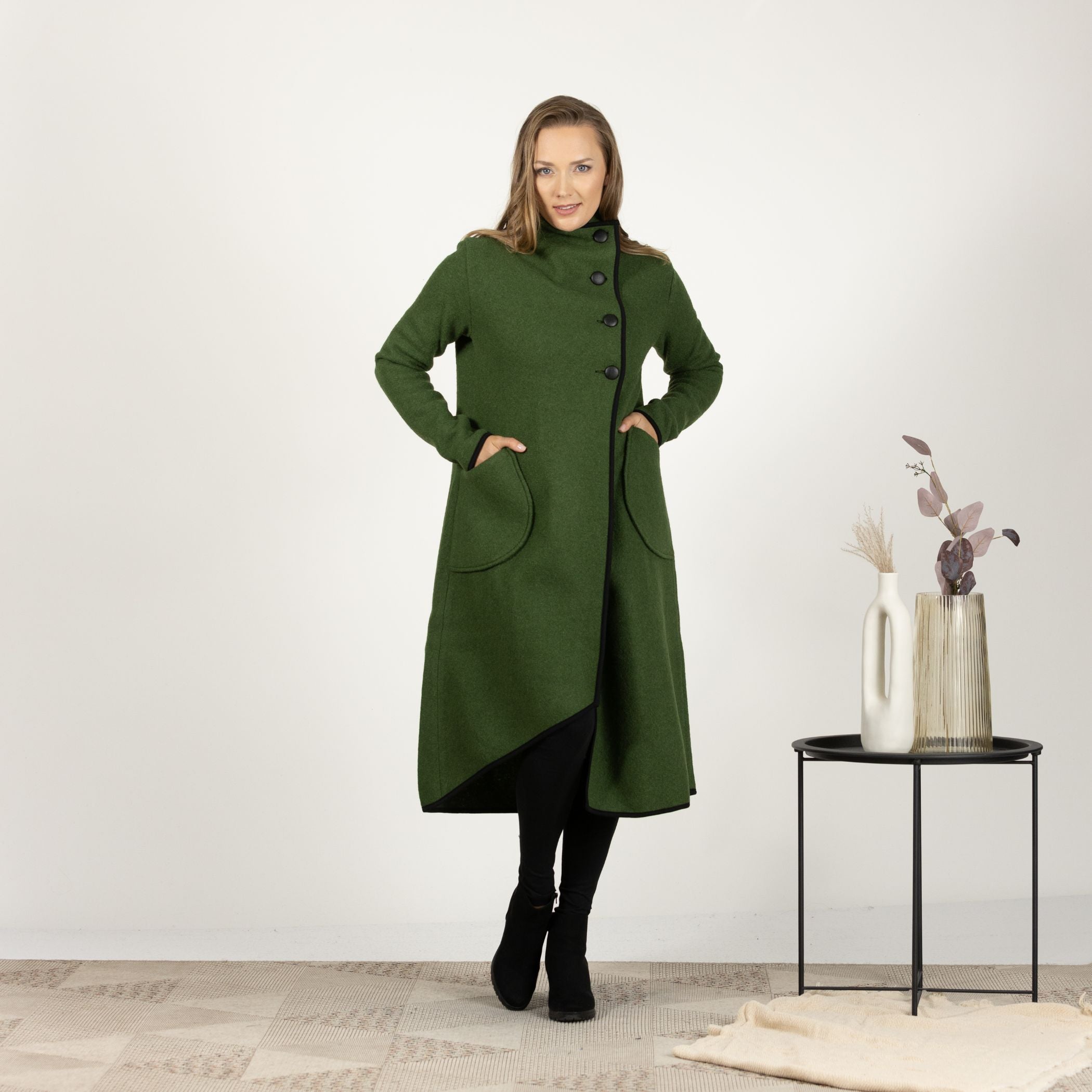 Front view of the Forest Green Boiled Wool Coat with Pockets, showcasing the rich color and classic overlapping front with three-button closure.