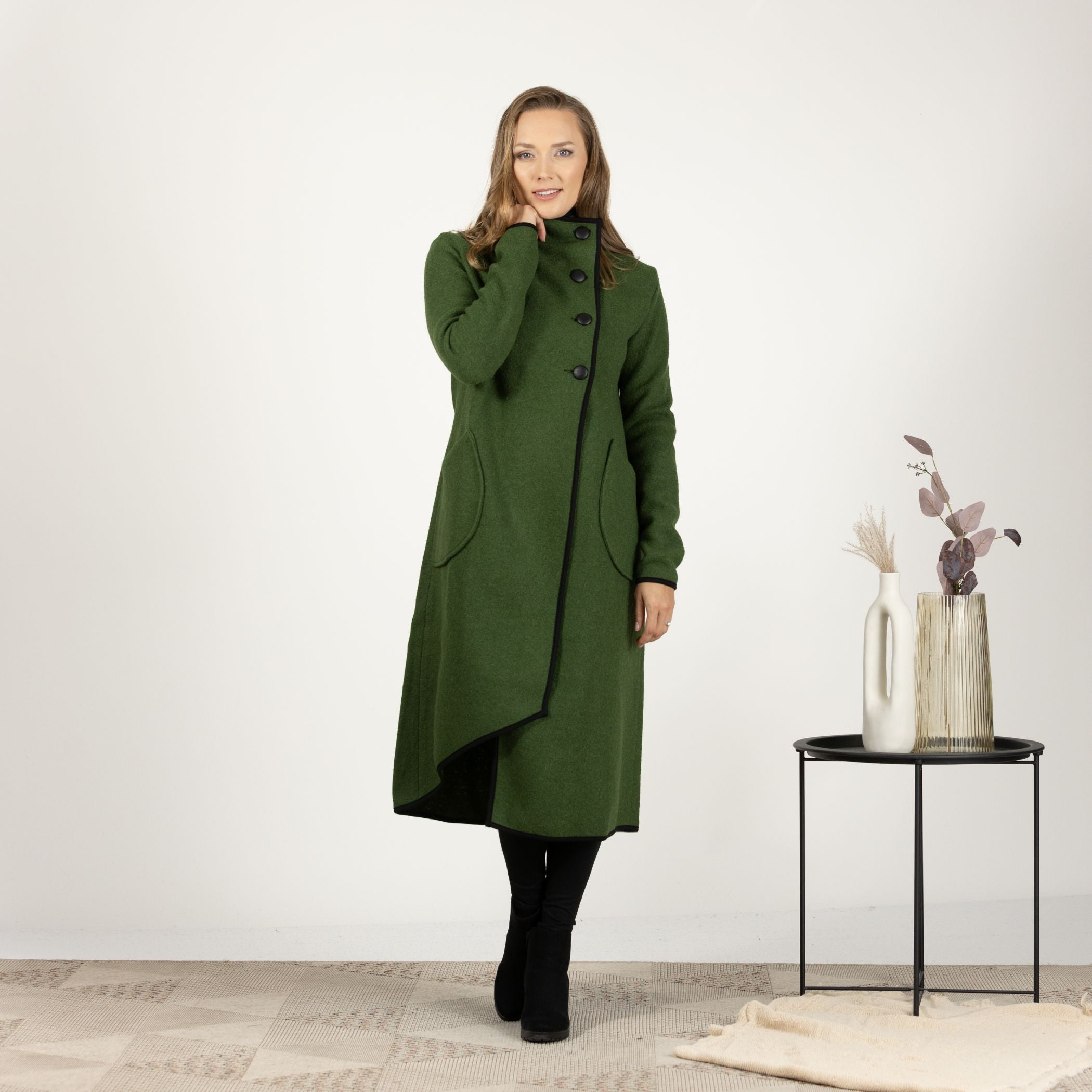 Full-length front view of the Forest Green Boiled Wool Coat with Pockets, highlighting the warm wool fabric and large, practical pockets