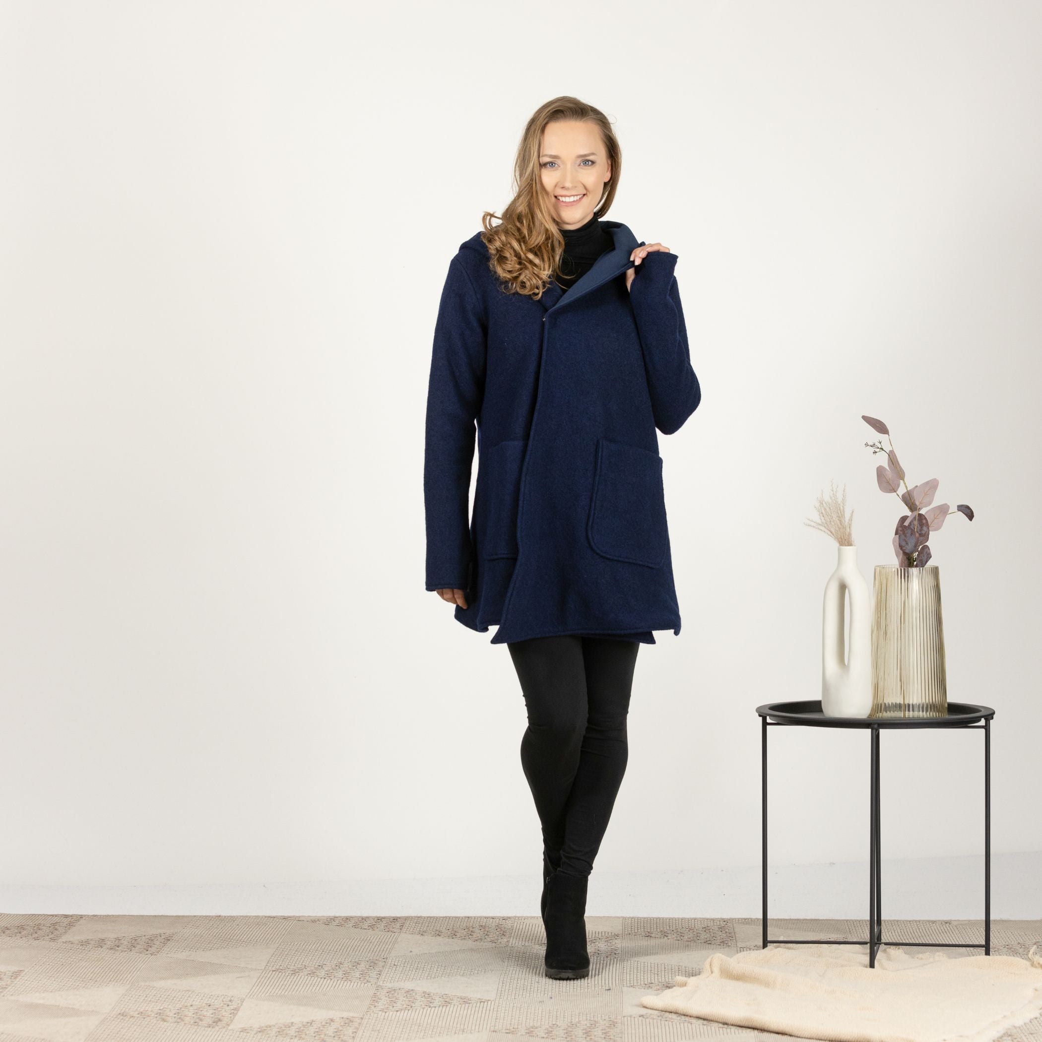 Front view of the Dark Blue Hooded Wool Cardigan, featuring the cozy hood and classic button-up design in a deep, rich color."