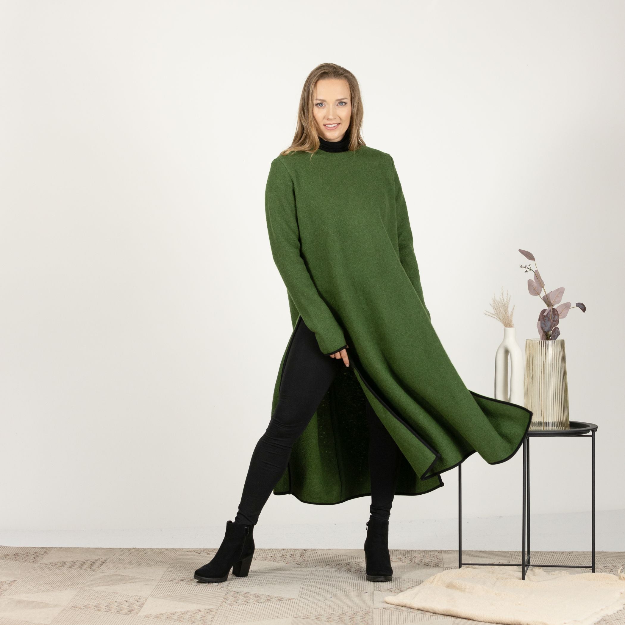 Close-up front view of the Forest Green Wool Winter Sweater Dress, focusing on the luxurious texture of the boiled wool fabric and the rich green hue.