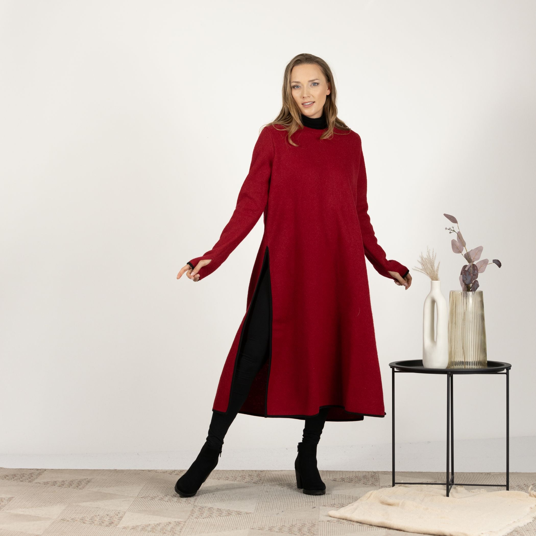 Full-length front view of the Raspberry Wool Winter Sweater Dress, highlighting the straight silhouette and stylish deep side slits.