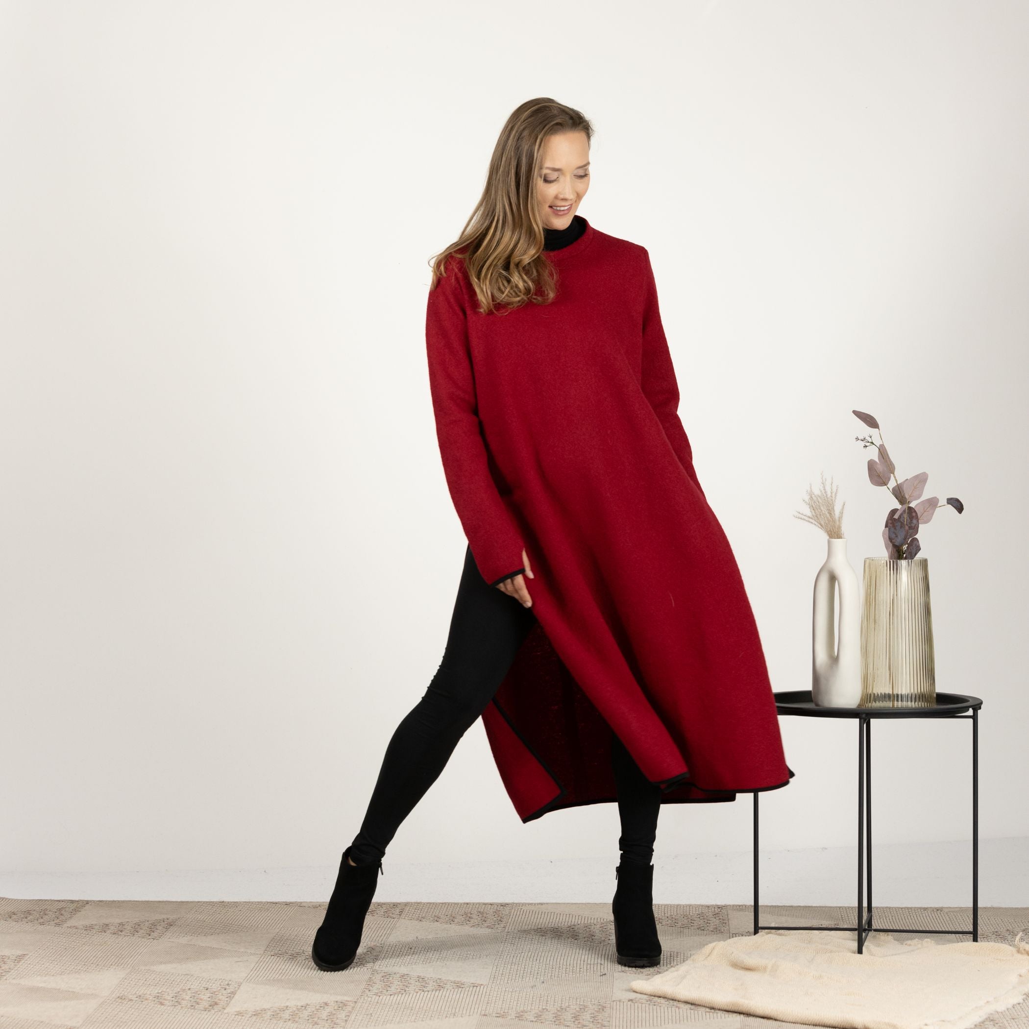 Front view of the Raspberry Wool Winter Sweater Dress, featuring deep side slits for a contemporary edge to the classic design.