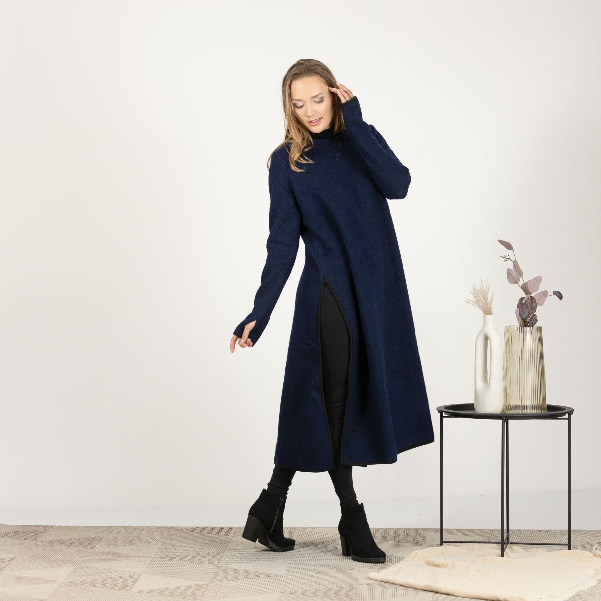 Full-length front view of the Dark Blue Wool Winter Sweater Dress, highlighting the straight silhouette and deep side slits.