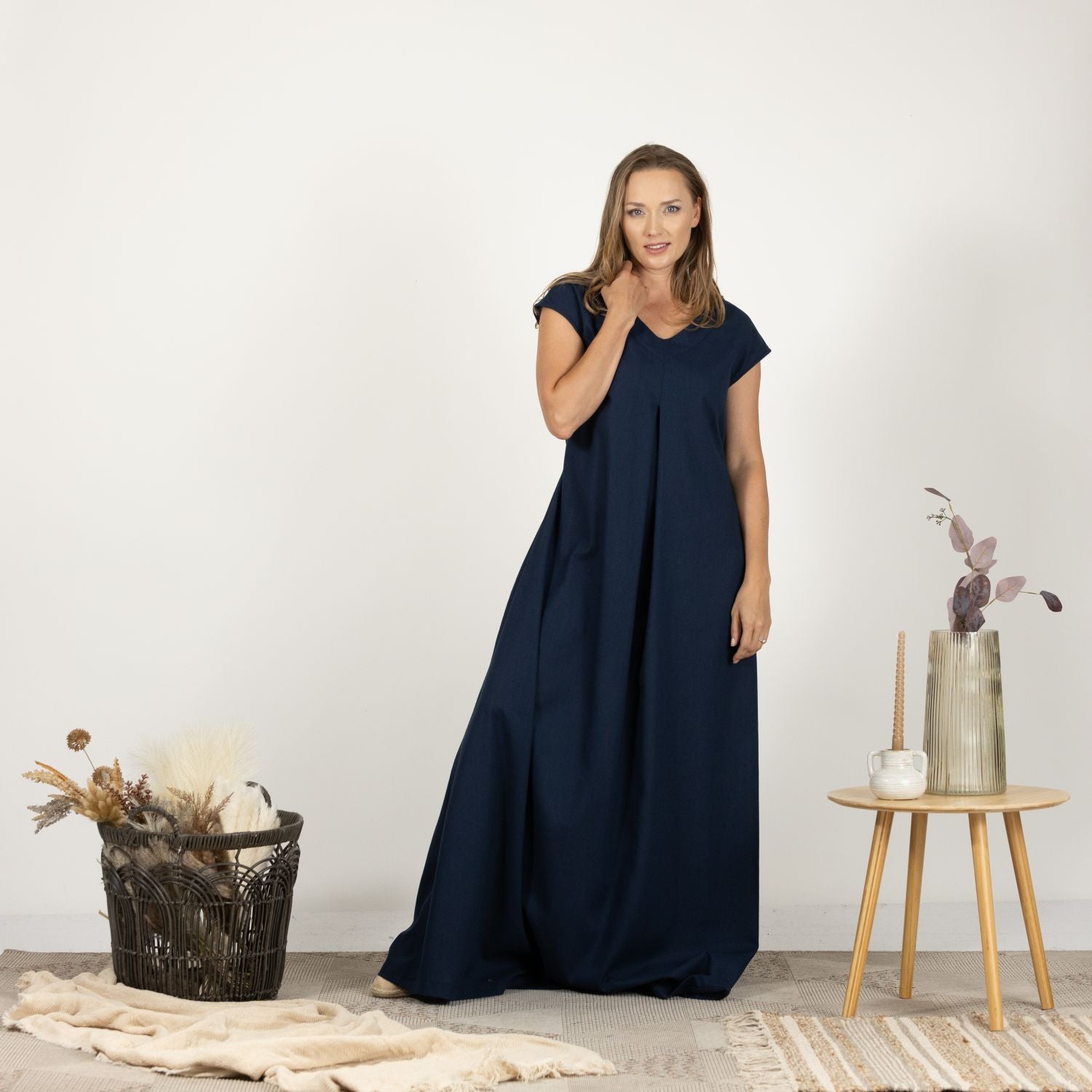 Front view of model wearing the Linen Loose Dress with Back Tie, showcasing its effortless fit and full-length design.