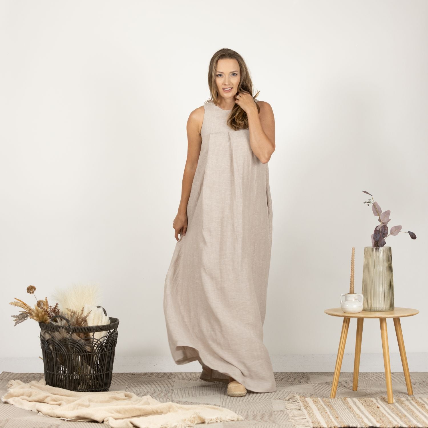 Detailed front view of the Loose Linen Maxi Dress in Natural, highlighting the relaxed fit and subtle texture of the breathable linen material.