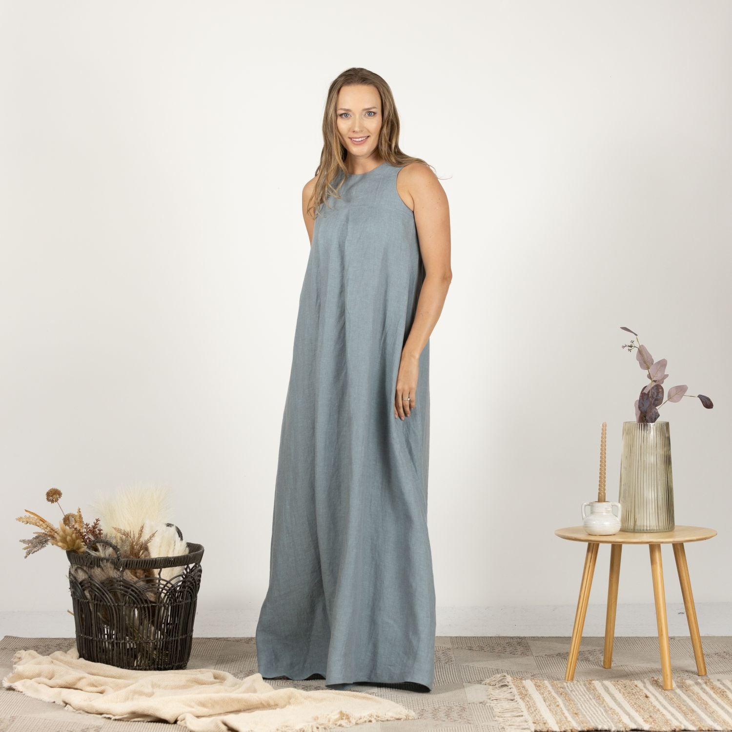 Front view of the Loose Linen Maxi Dress in Dusty Blue, featuring a relaxed trapeze silhouette and lightweight fabric, perfect for warm weather.