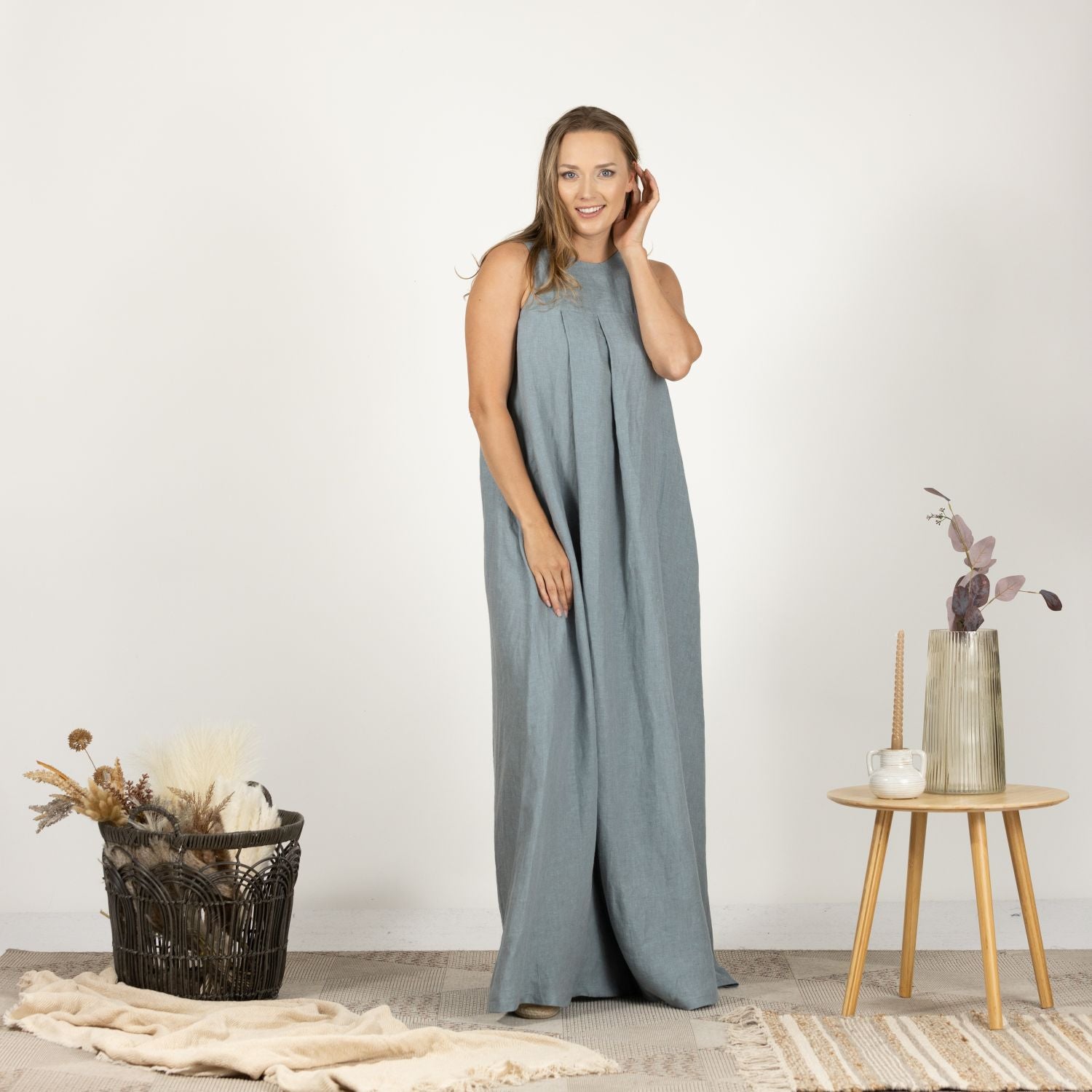 Full-length front view of the Loose Linen Maxi Dress in Dusty Blue, displaying the elegant trapeze silhouette and comfortable, airy linen fabric.