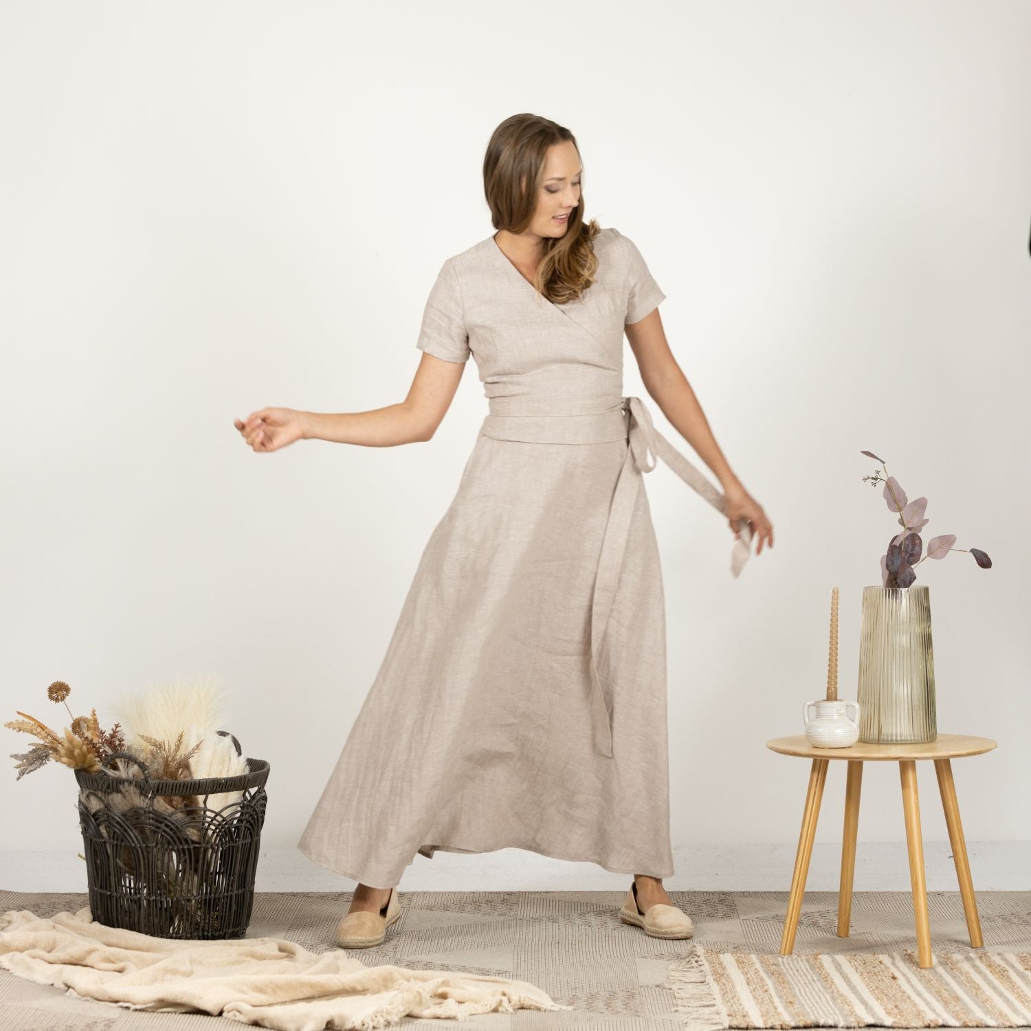 View of the Linen Wrap Around Dress with Waist Tie, focusing on the V-neck design and high-quality linen fabric.