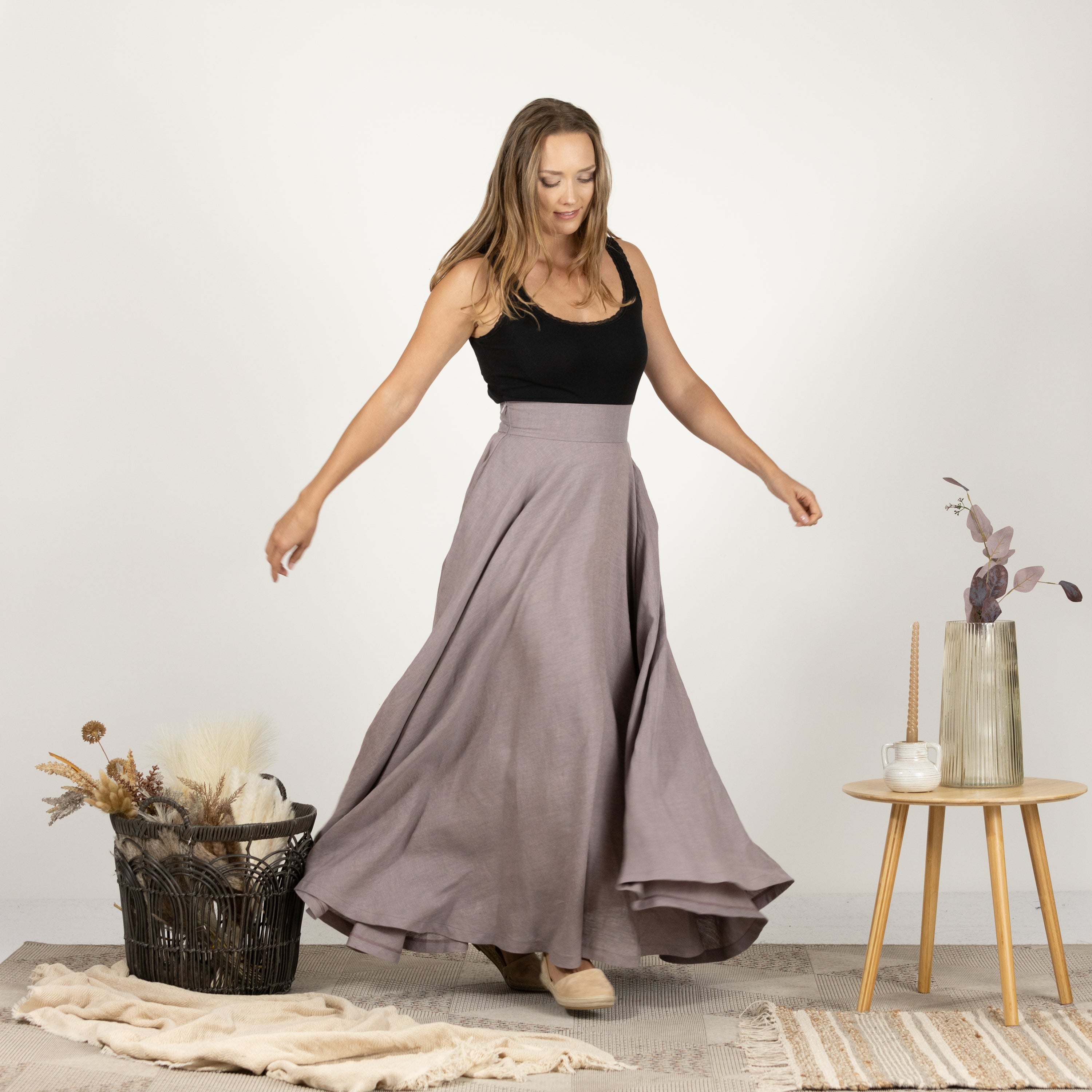 Model in the Linen Flutter Skirt, front view capturing the skirt's flowing and airy fabric.