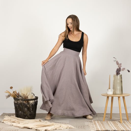 Front view of model wearing the Linen Flutter Skirt, showcasing its full length and high waist design.