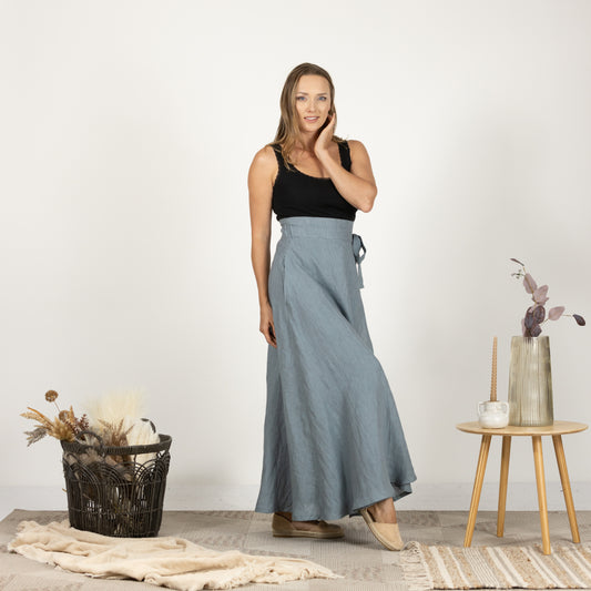 Front view of model wearing the Linen Wrap Around Skirt with Tie, showcasing its full length and adjustable tie design.