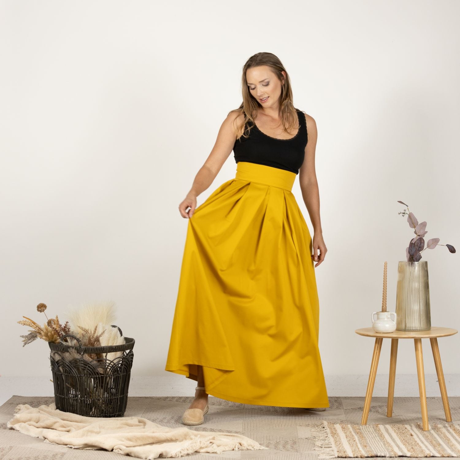 Model in the Cotton Skirt with High Rise, front view capturing the minimalist design and comfortable fit.