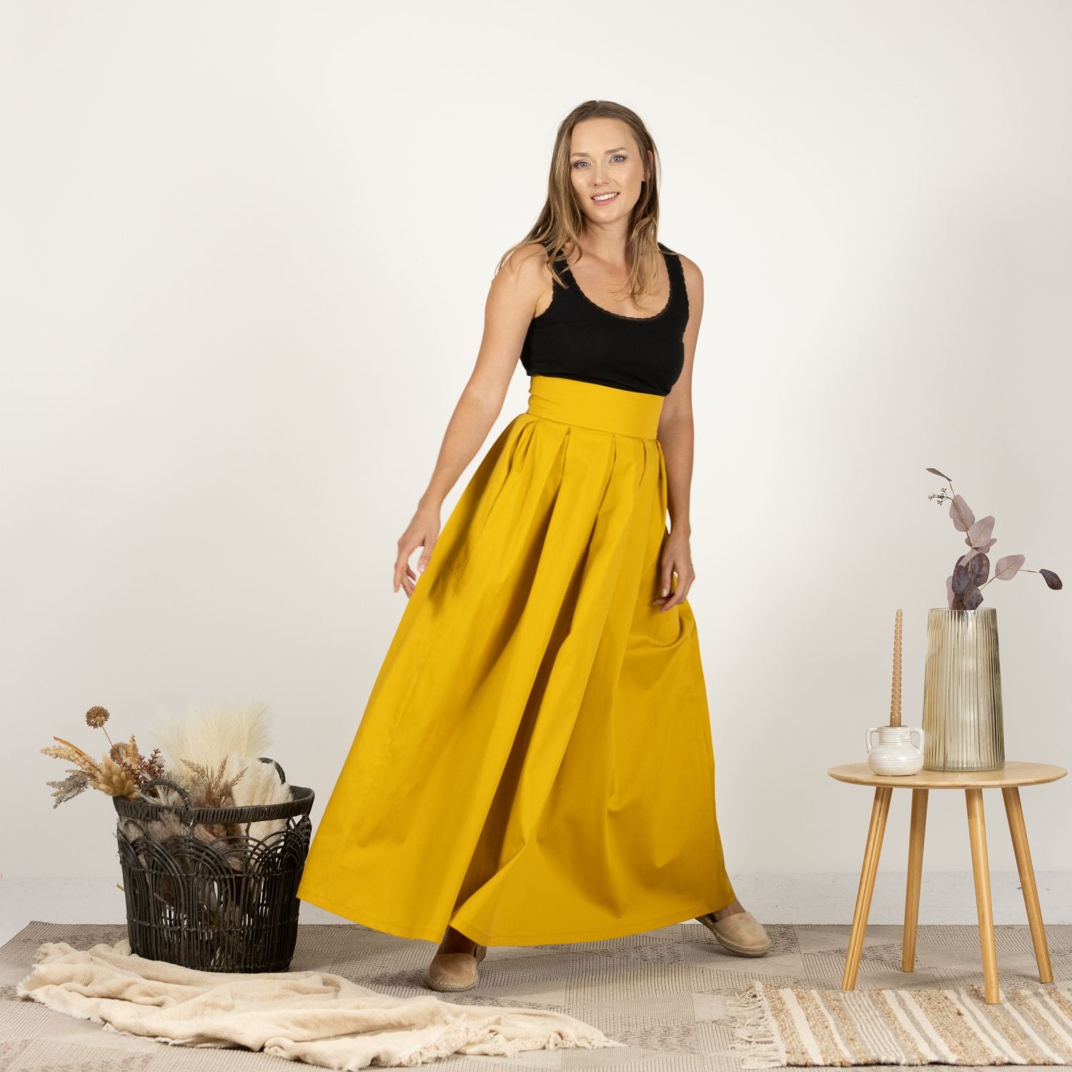 Front-facing shot of the Cotton Skirt with High Rise, emphasizing its versatile style and flattering silhouette.