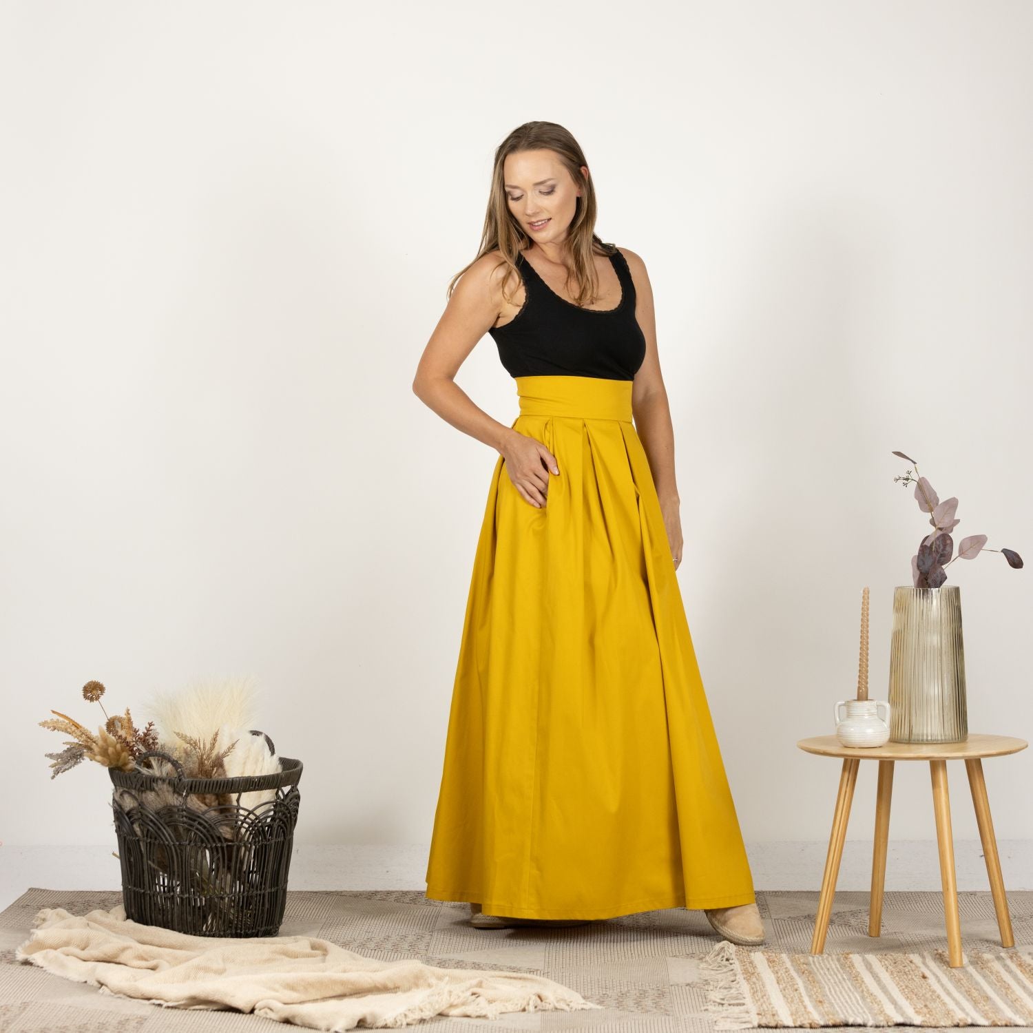 Model in the Cotton Skirt with High Rise, side view capturing the airy and breathable cotton fabric.