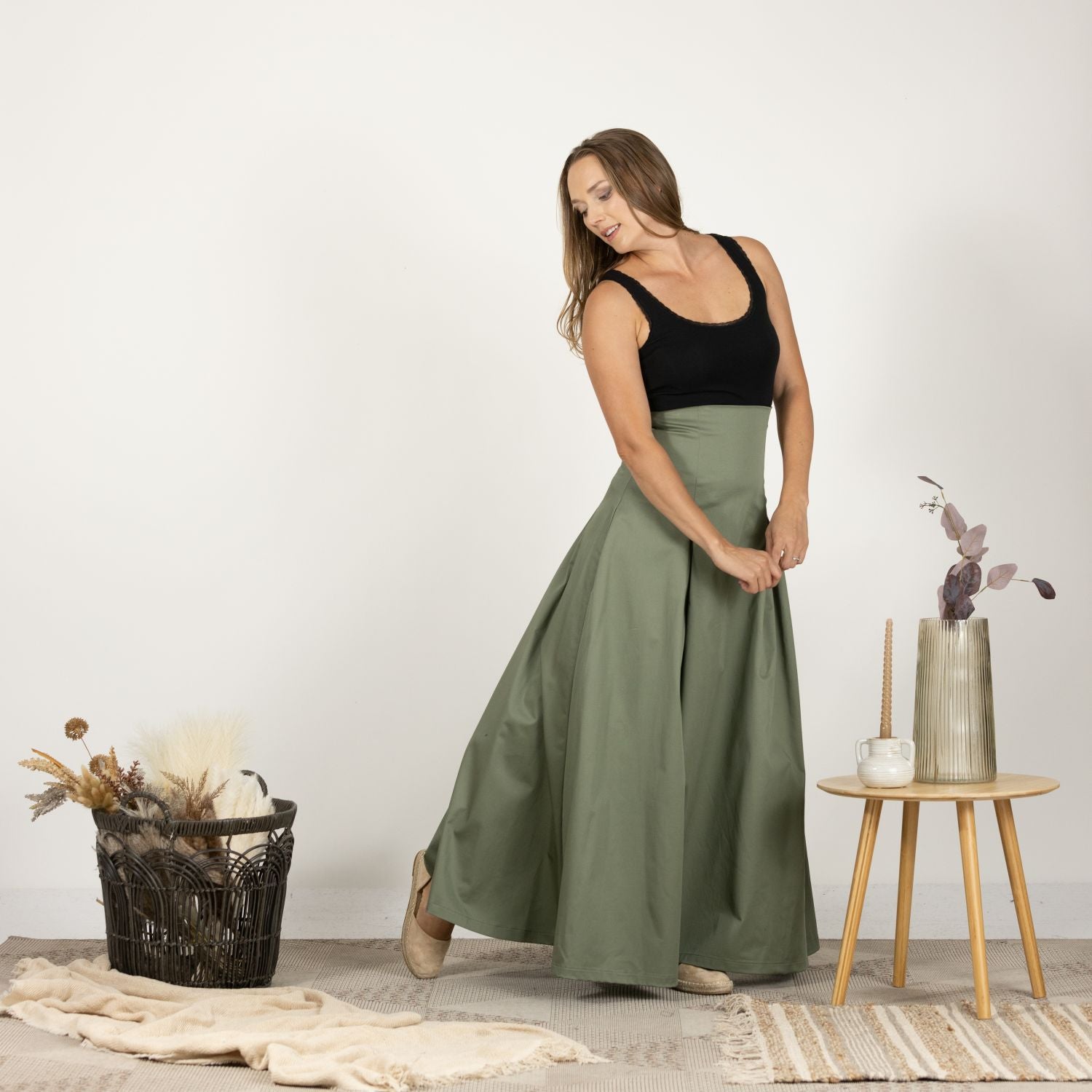 Model in the front view of the Ultra High-Waist Cotton Skirt, highlighting the minimalist and elegant style."