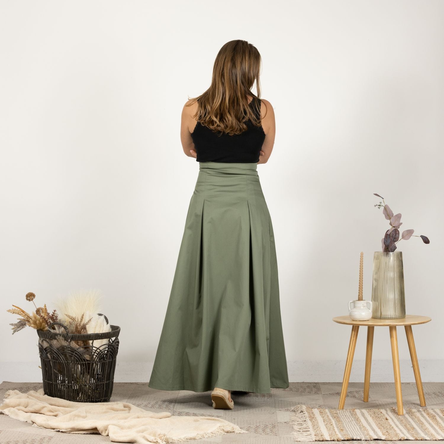 Back view of model in the Ultra High-Waist Cotton Skirt, showing the skirt's full length and relaxed fit.