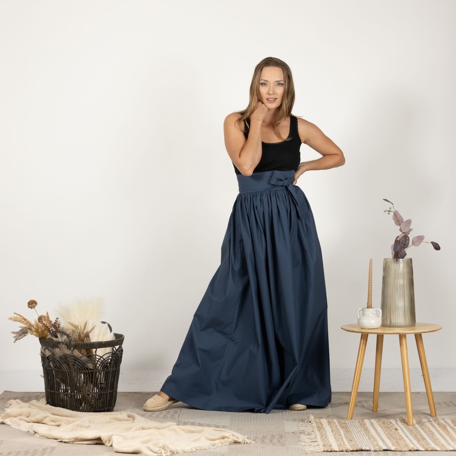 Close-up front view of the Loose High Waist Skirt in Slate Blue, focusing on the subtle texture of the cotton fabric and the clean lines of the high waist design."