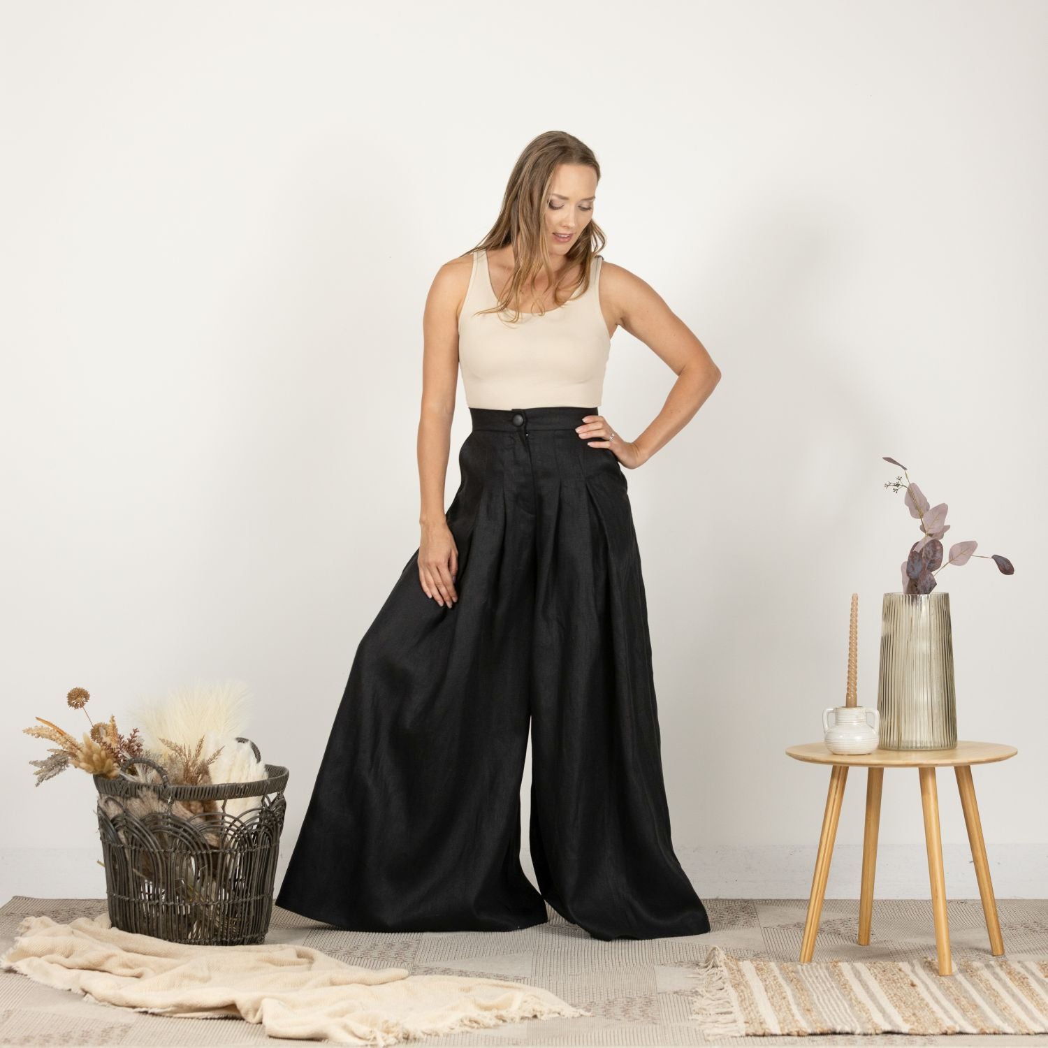 Front perspective of the Lightweight Linen Pants with High Waist on model, highlighting the pants' elegant and timeless design.