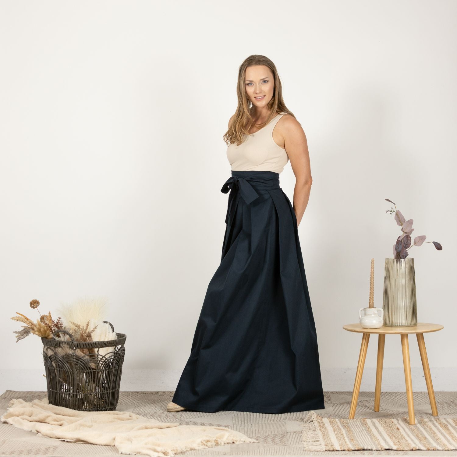 Close-up of the High Waist Pleated Maxi Skirt in Dark Blue, emphasizing the durable cotton-elastane fabric and the detailed pleating.