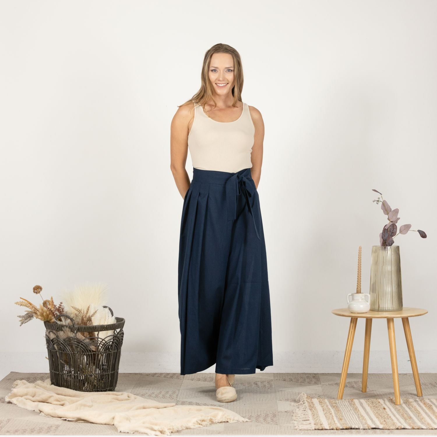 Front view of the Dark Blue Melange Wide Leg Linen Pants, showcasing the elegant palazzo style with a high waist and wide-leg design.