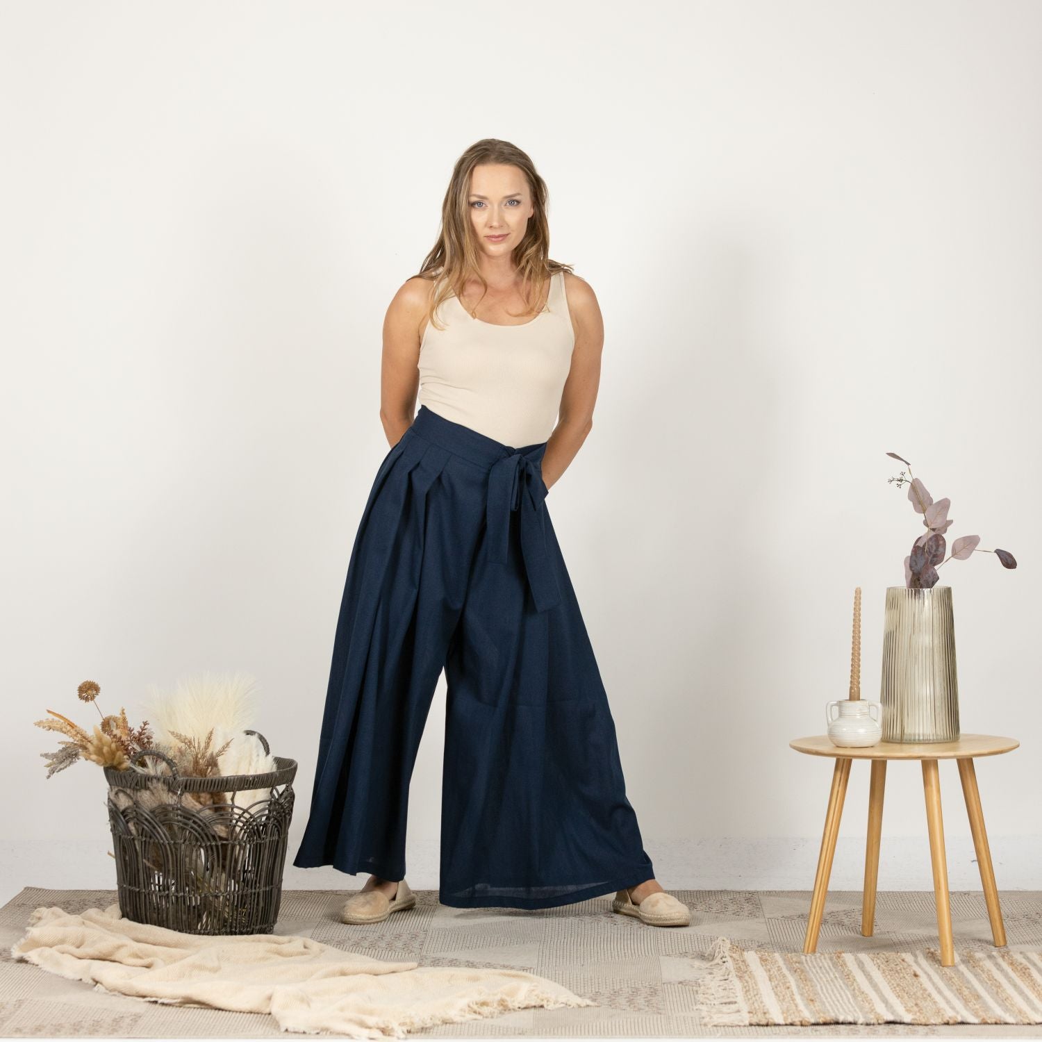 Full-length front view of the Dark Blue Melange Wide Leg Linen Pants, highlighting the flattering wide leg silhouette and the stylish bow detail at the waist.