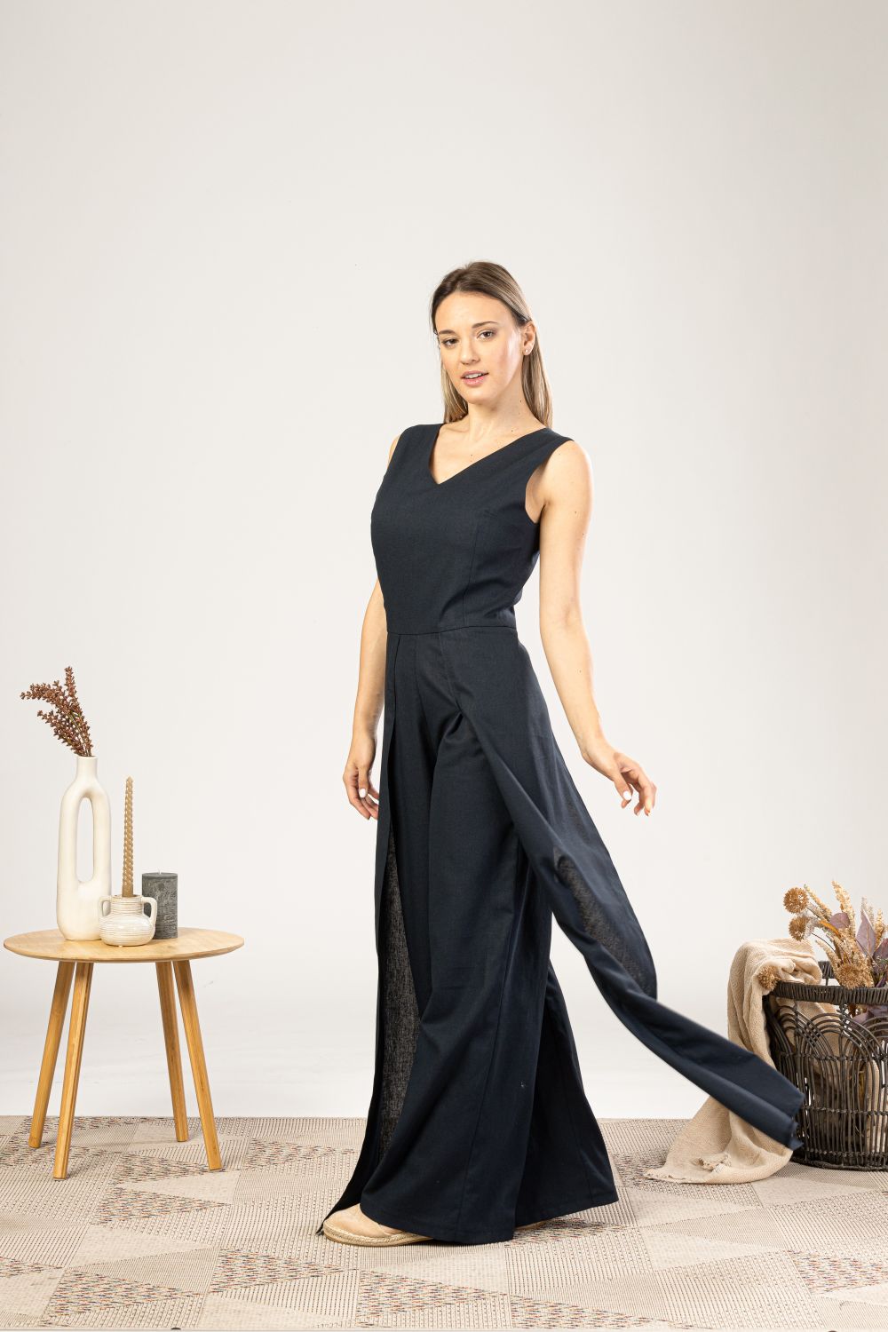 Black Linen Maxi Jumpsuit with Flaps from the side view - from NikkaPlace | Effortless fashion for easy living