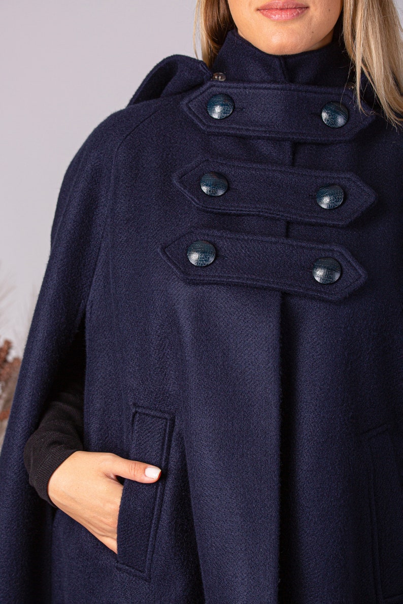 Front button closure on Hooded Winter Cape Coat - from Nikka Place | Effortless fashion for easy living