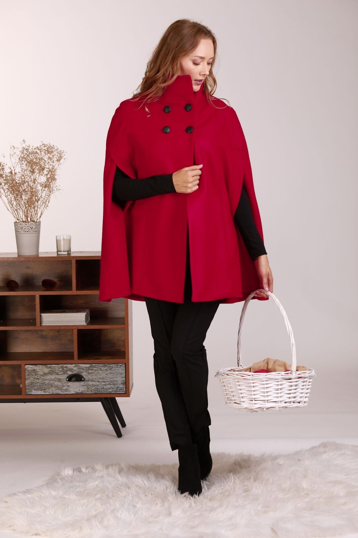 Model wearing the Raspberry Elegant Cape Coat - from NikkaPlace | Effortless fashion for easy living