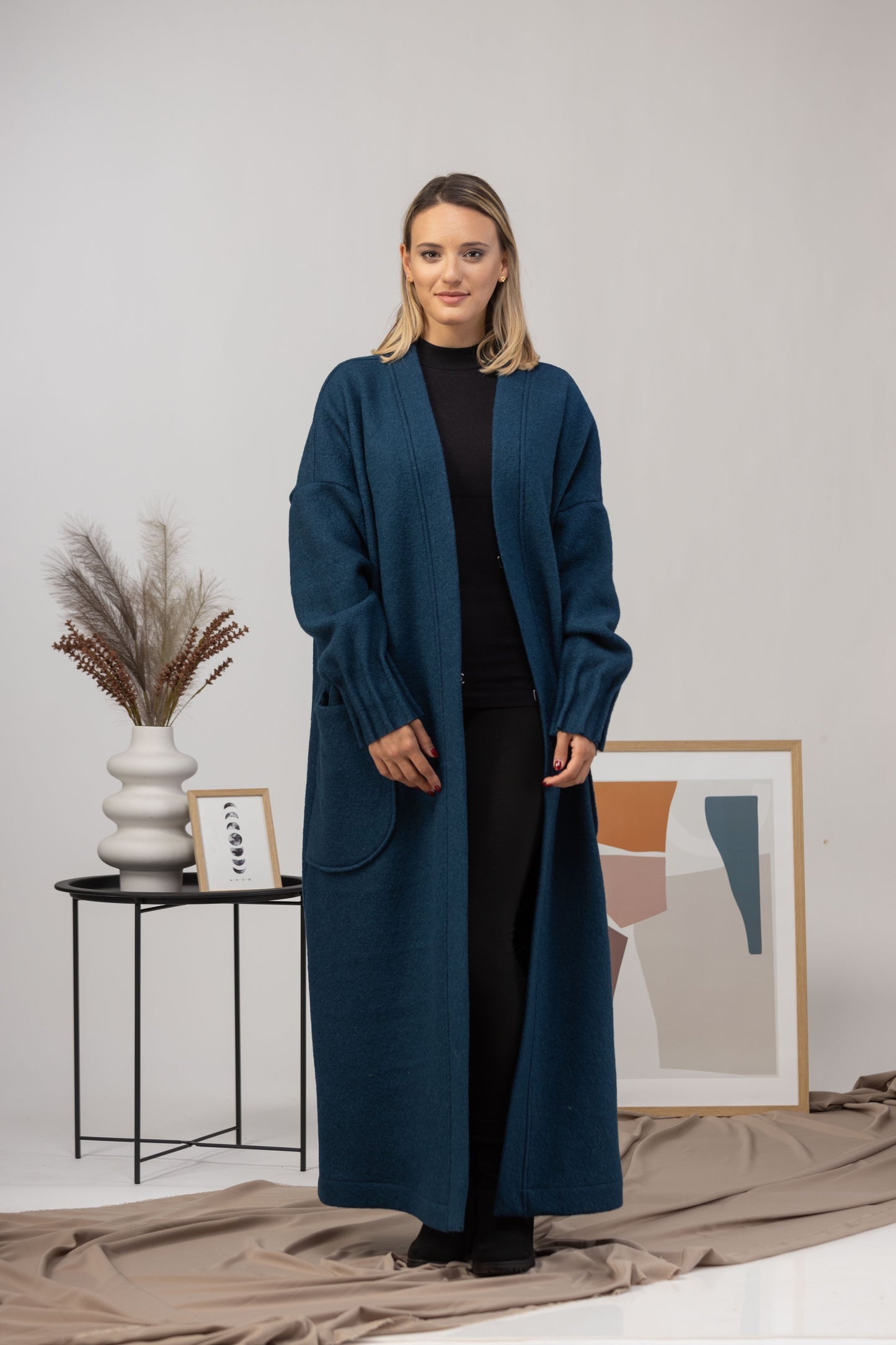Prussian Blue Warm Wool Maxi Cardigan being worn with a statement belt for a cinched waist look - from NikkaPlace | Effortless fashion for easy living