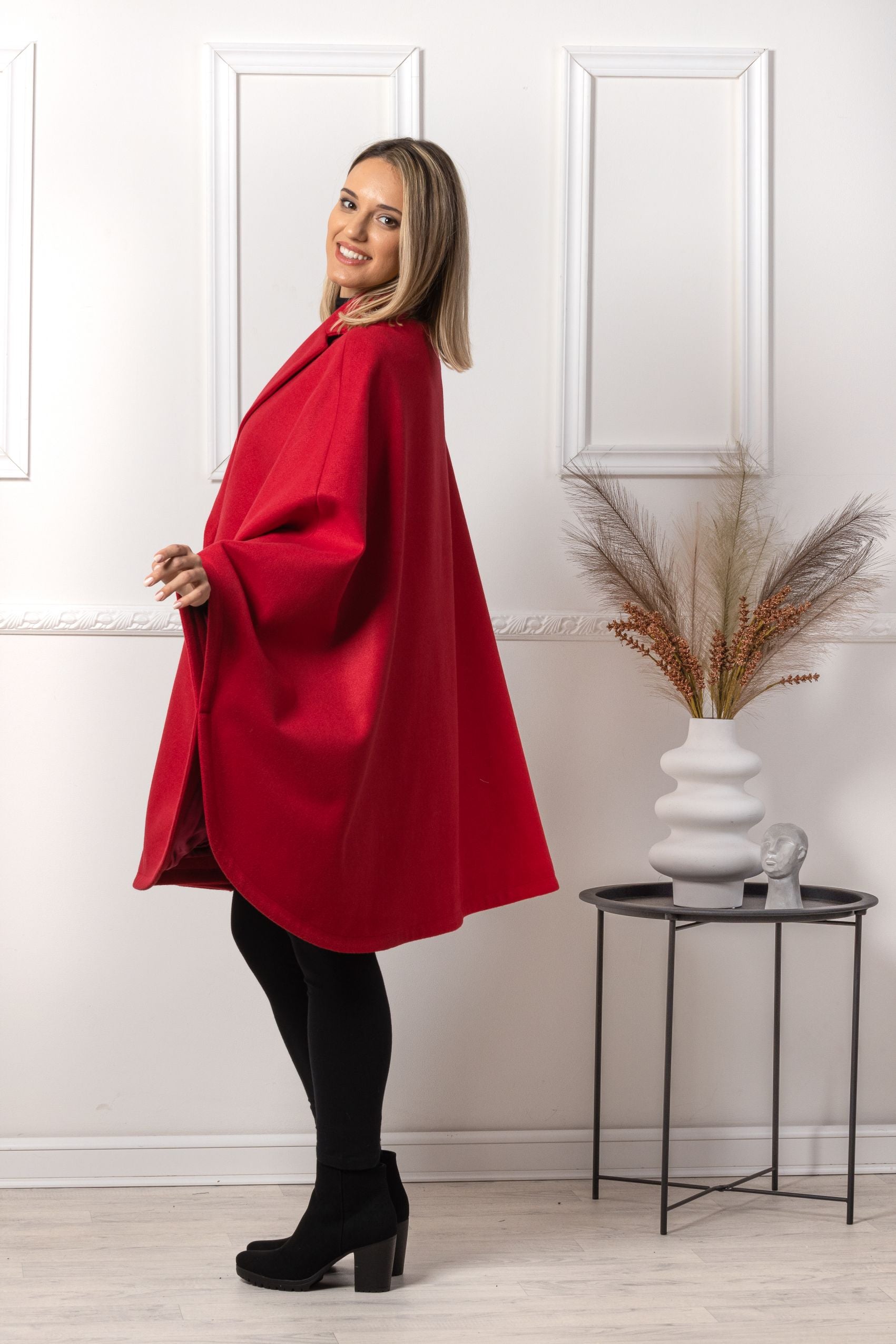 Upgrade your wardrobe with our Dark Navy Cape Coat - Effortless fashion and easy living from NikkaPlace