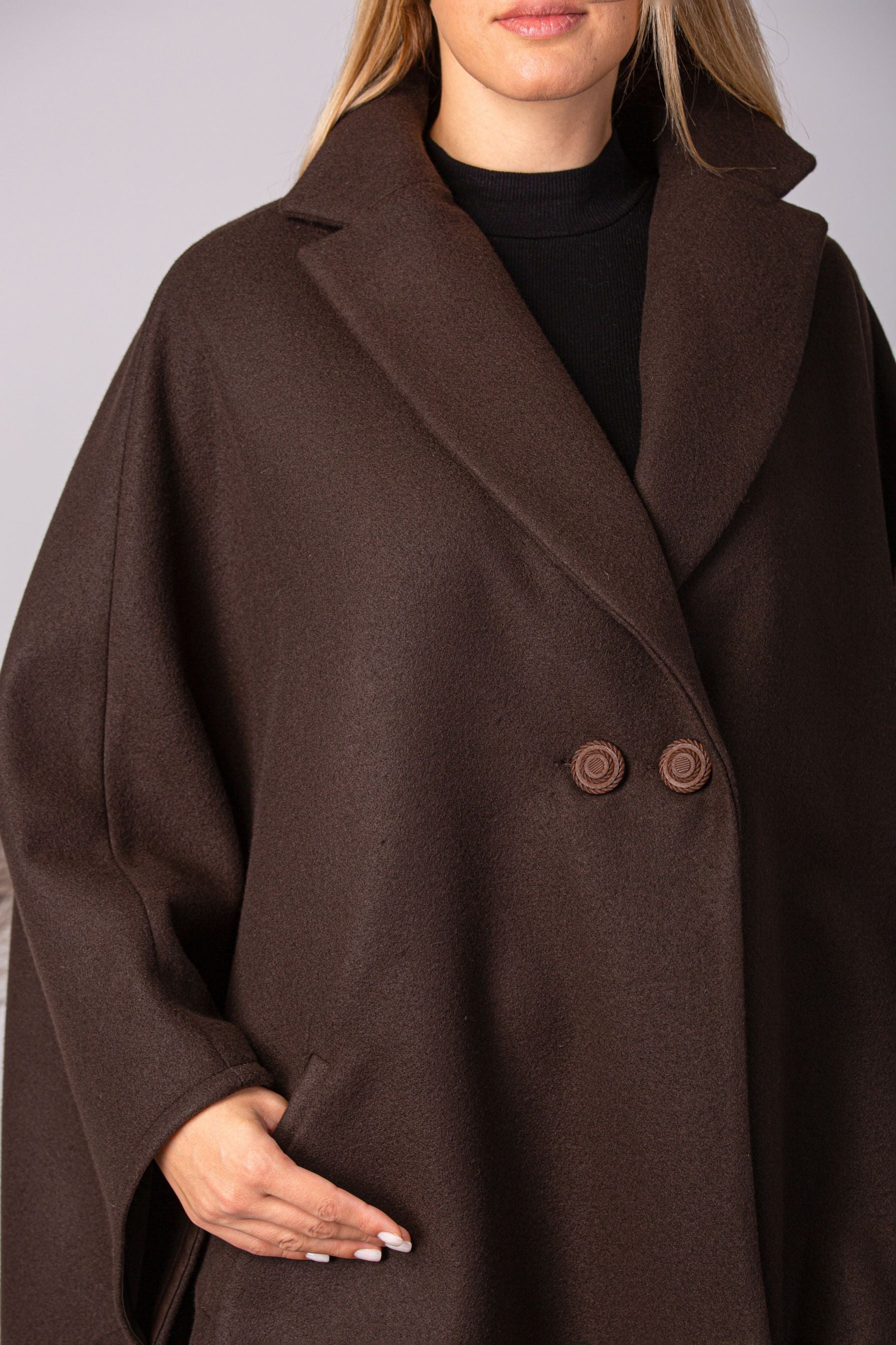 Effortless fashion and easy living with our Dark Navy Collared Cape Coat from NikkaPlace